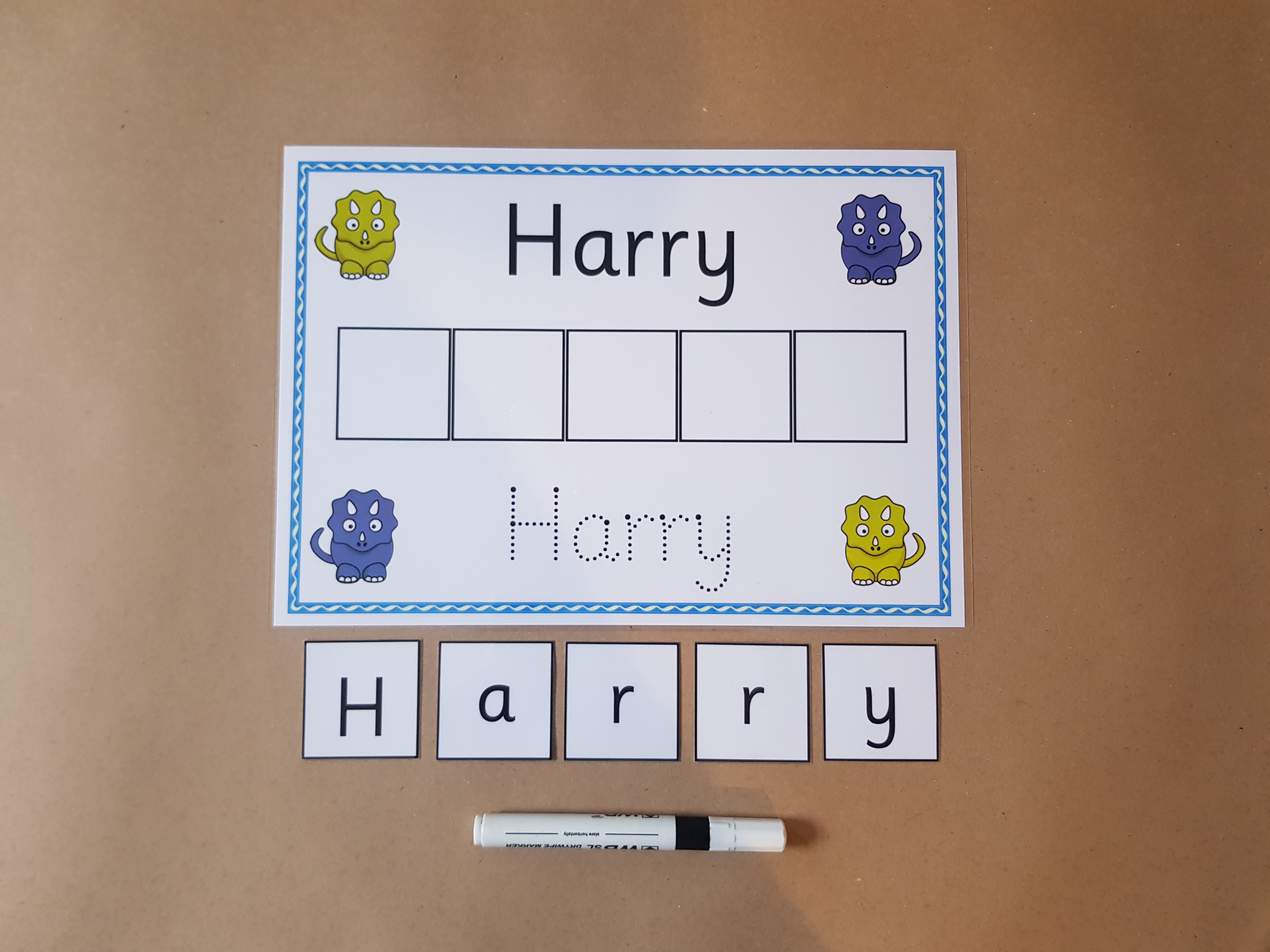 Write and Spell Name card - dinosaurs design 