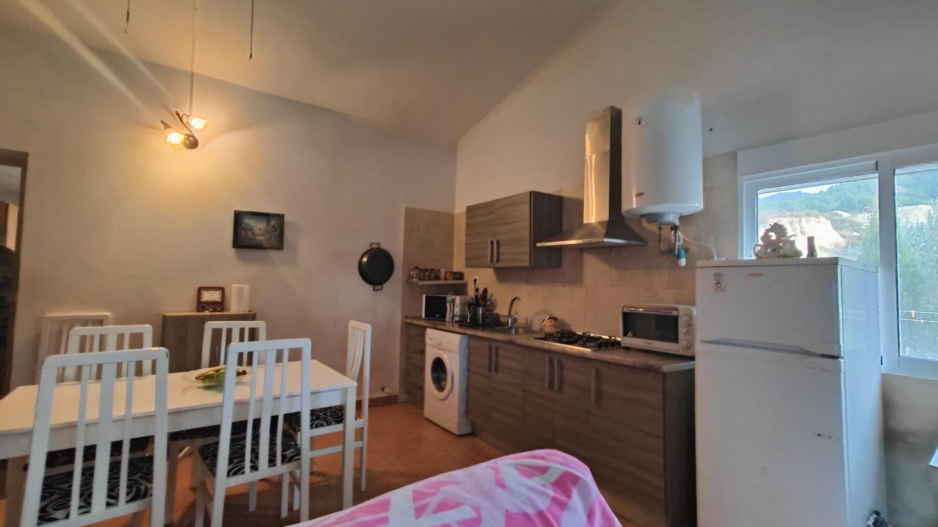 Casa con parcela ( Pliego )