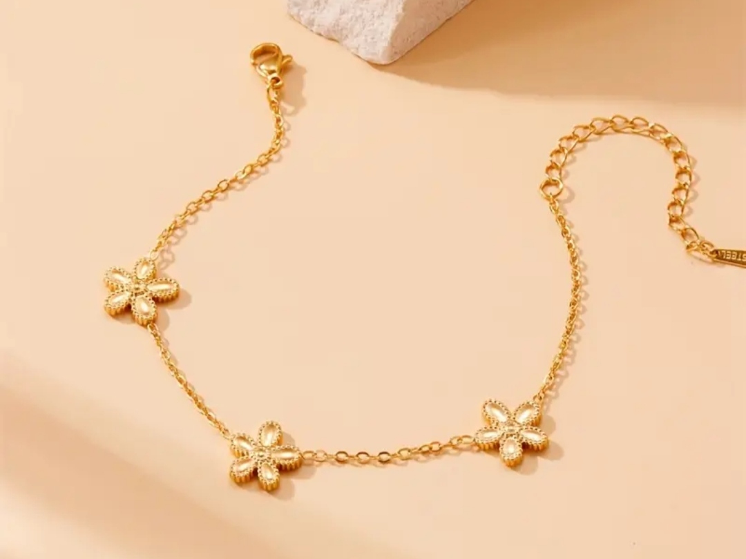 Pulsera de flores doradas