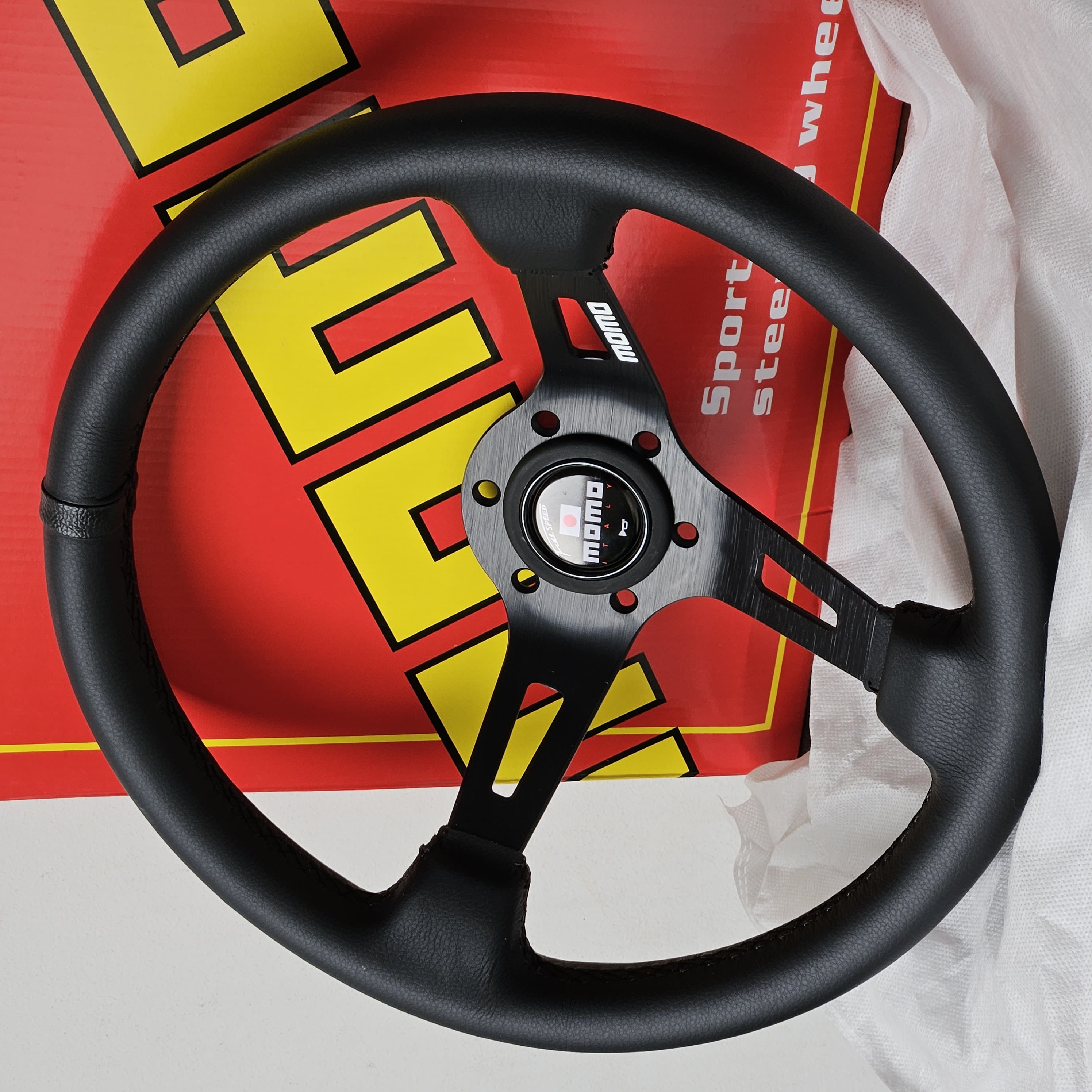 Stir Racing Momo Mod 08 Hitam/Putih/Kuning Kulit 14 Inch Celong