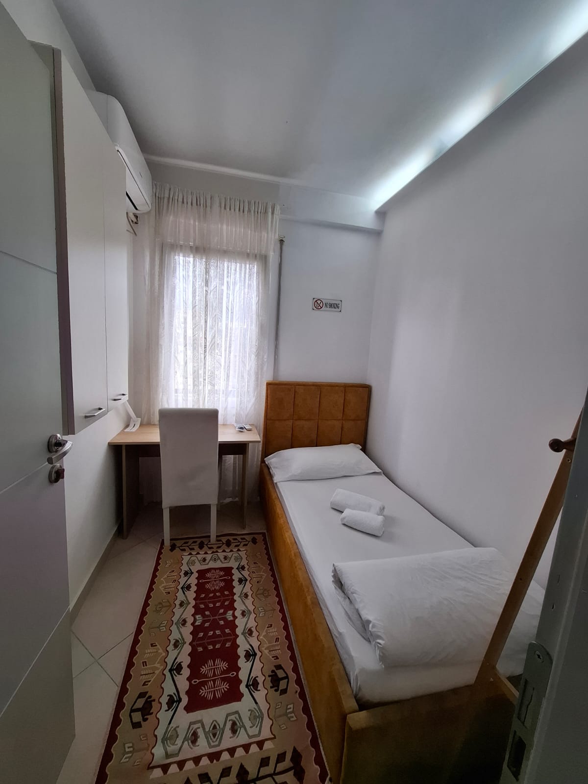 3. Single room with shared bathroom