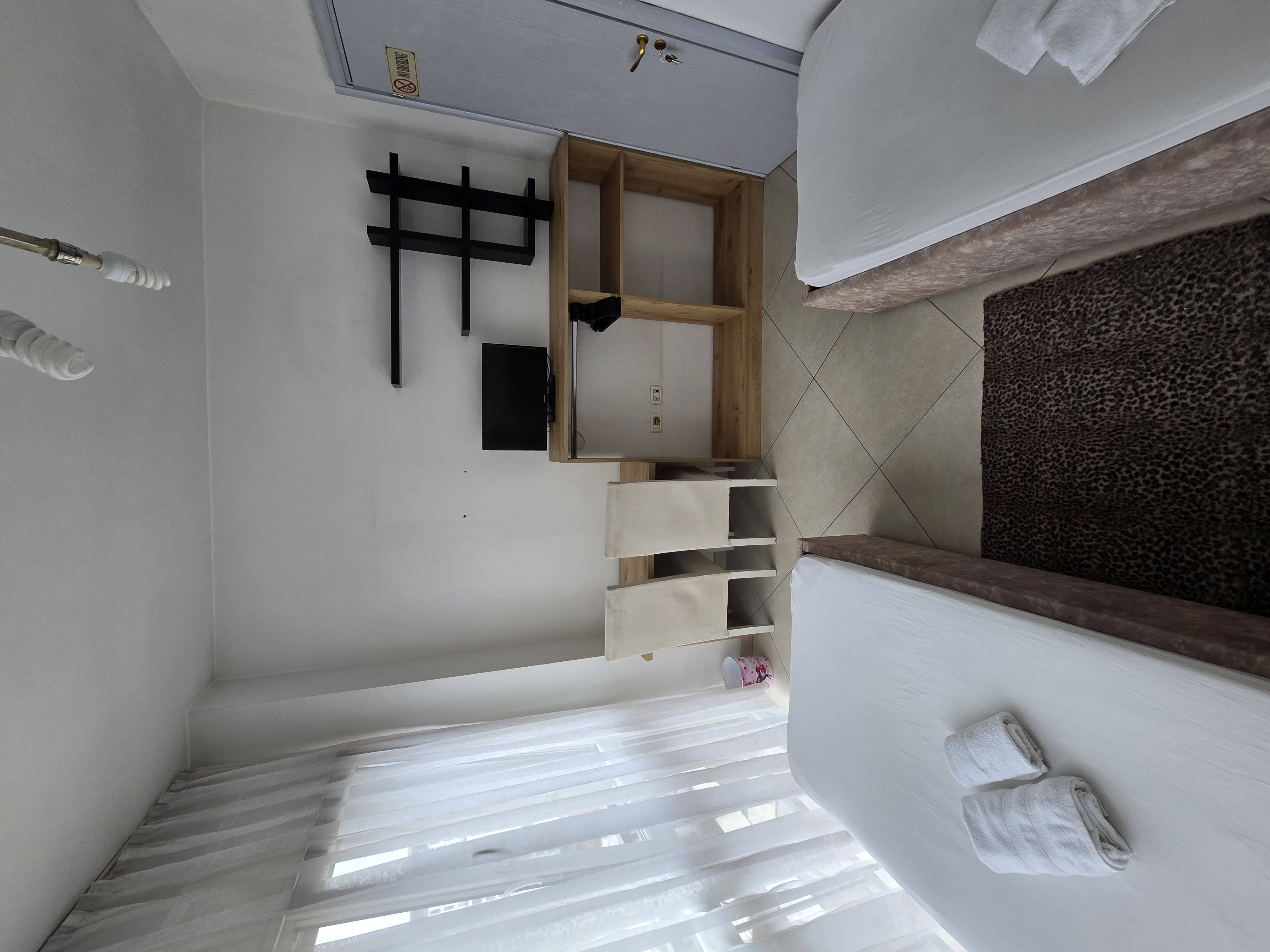 2. Twin room with shared bathroom