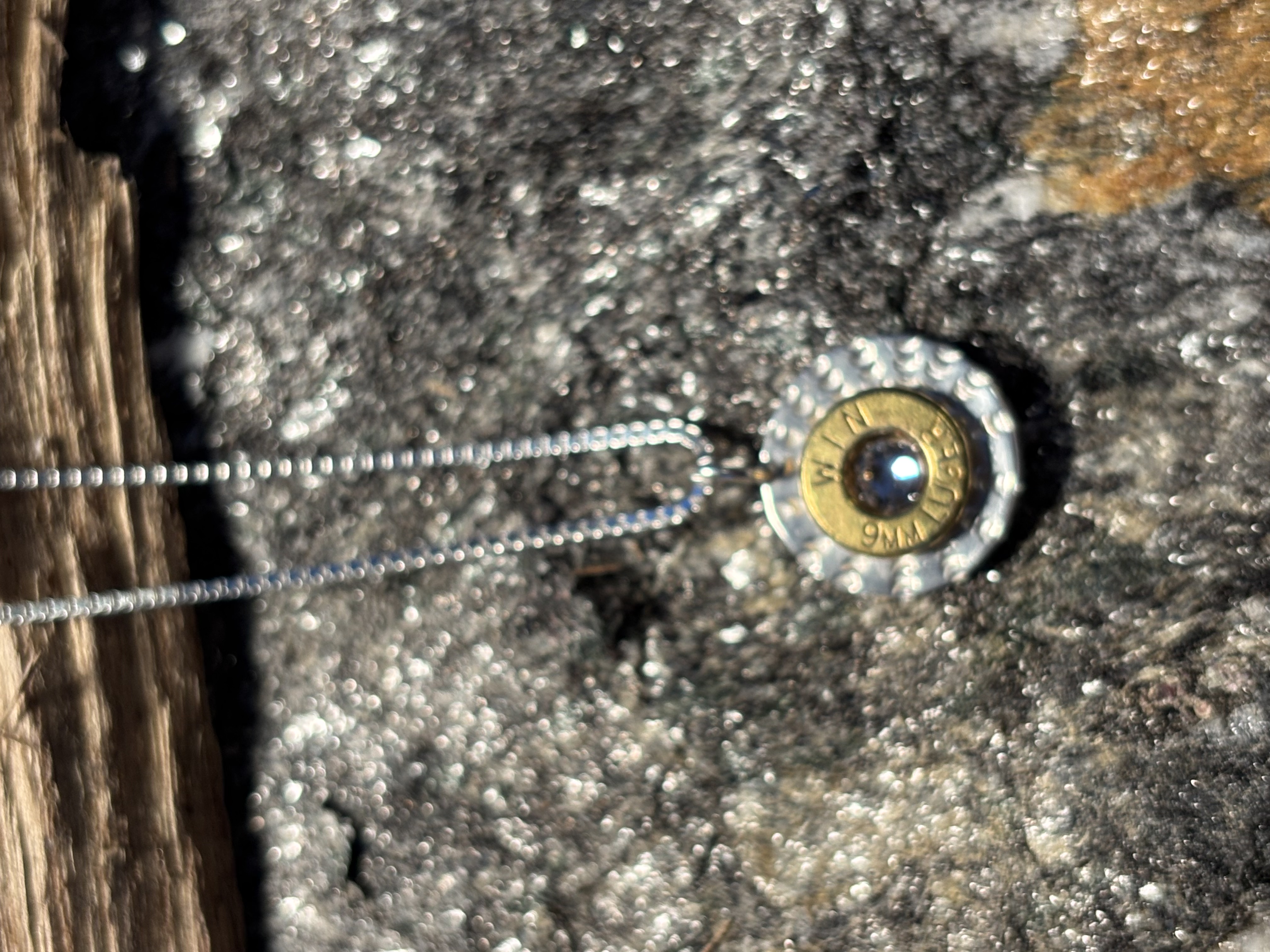 Handmade Sterling Silver and Brass Bullet Slice Pendant