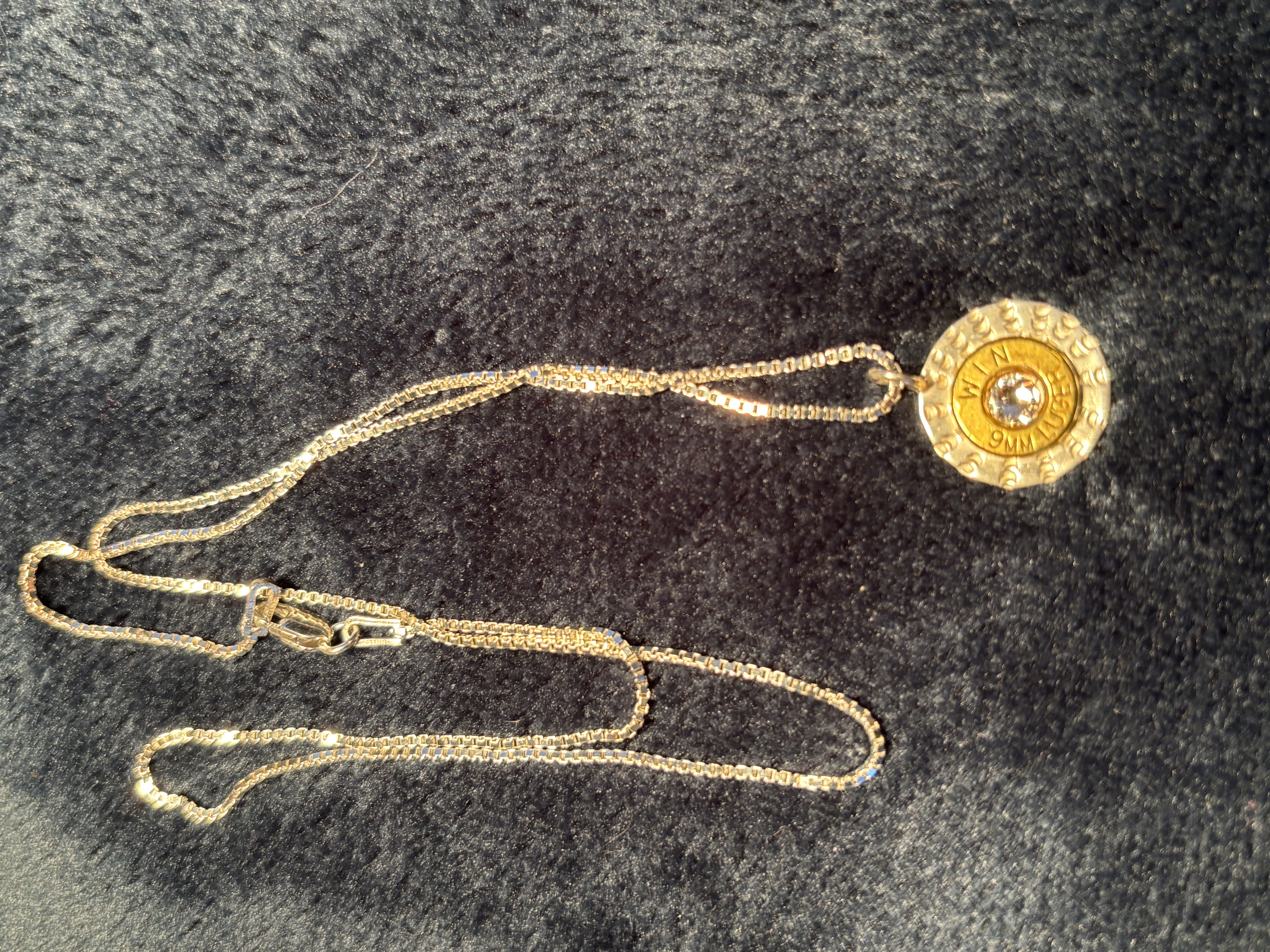 Handmade Sterling Silver and Brass Bullet Slice Pendant