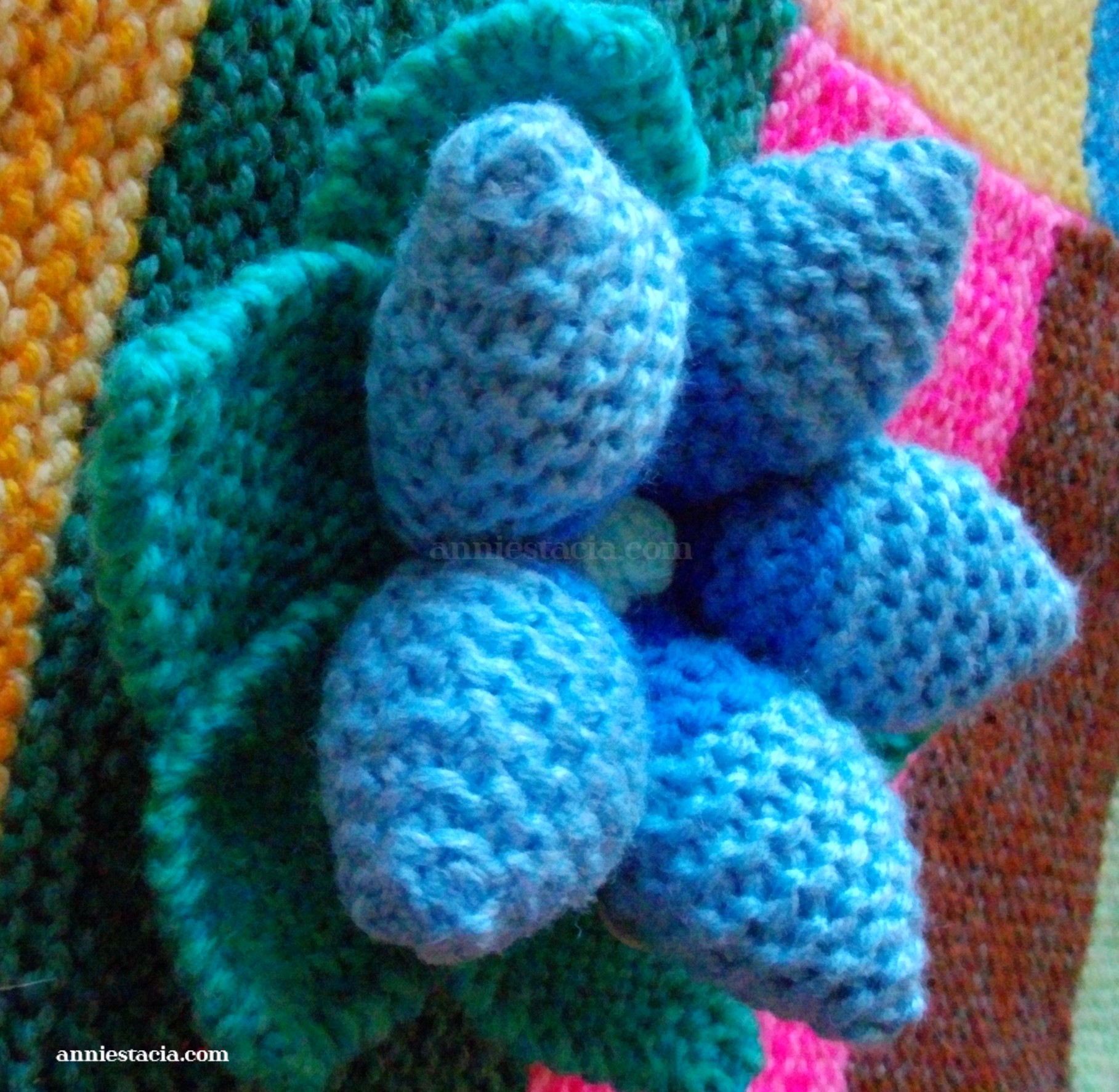 Light blue knitted flowerbowl 