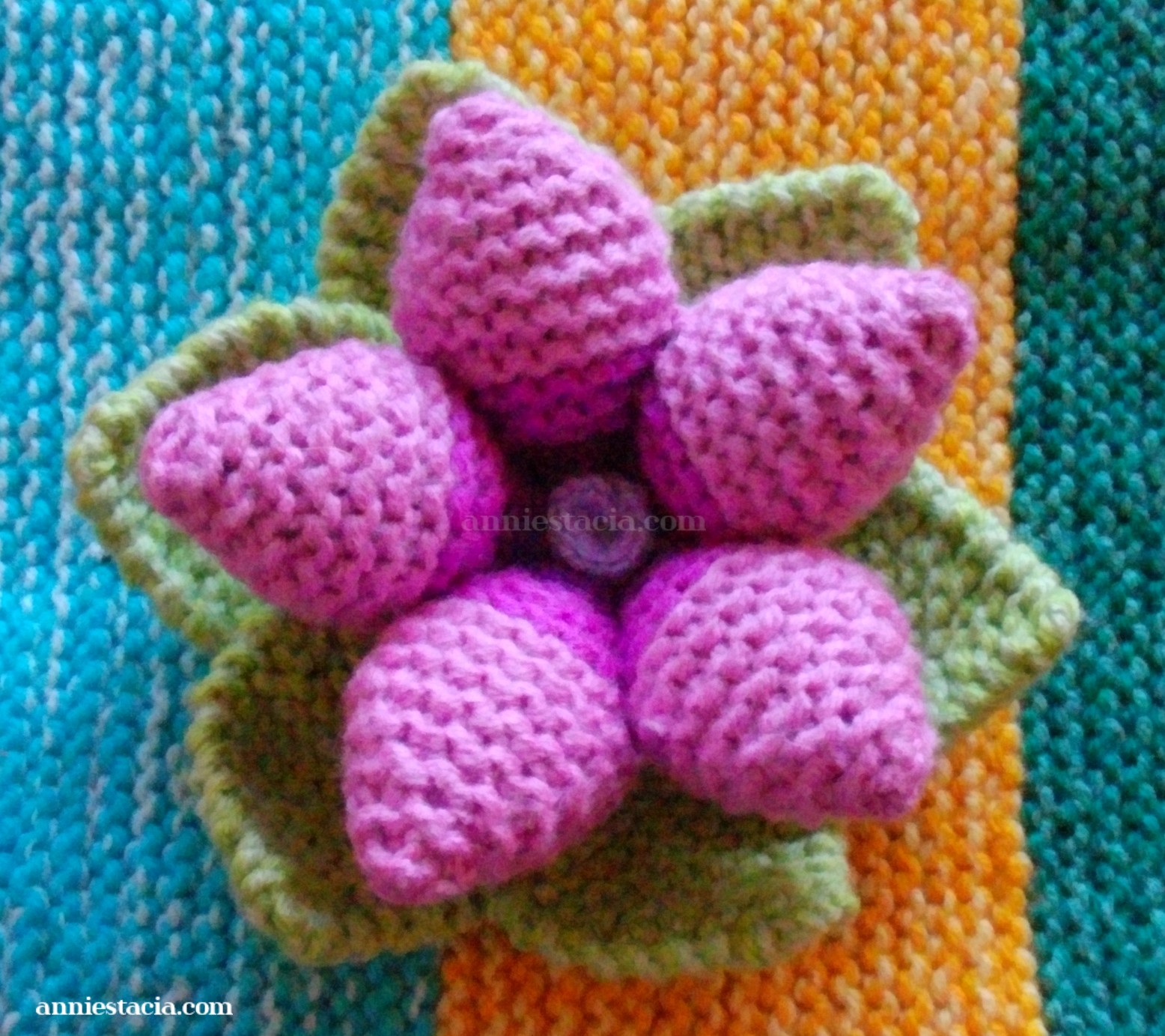 Purple knitted flower