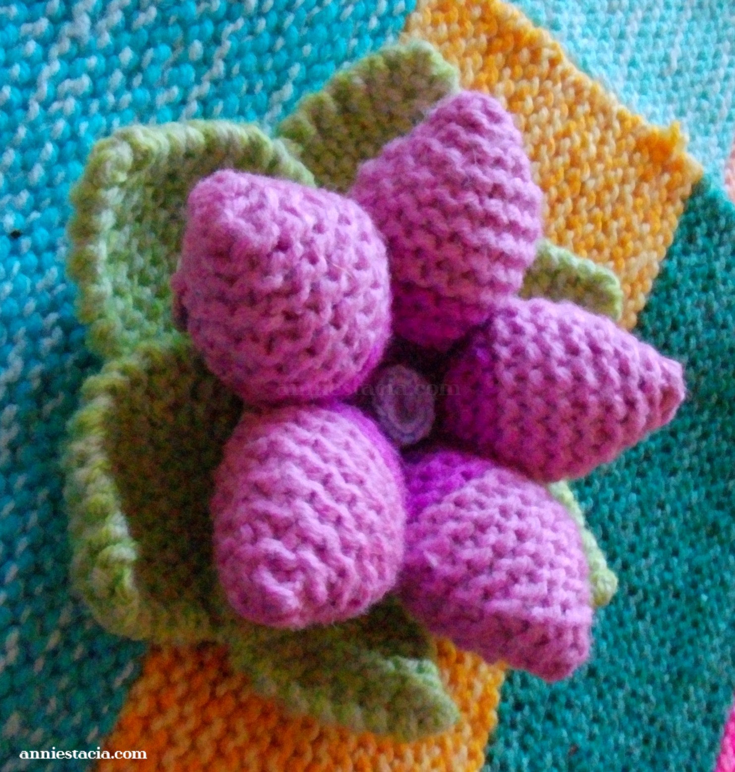 Purple knitted flower