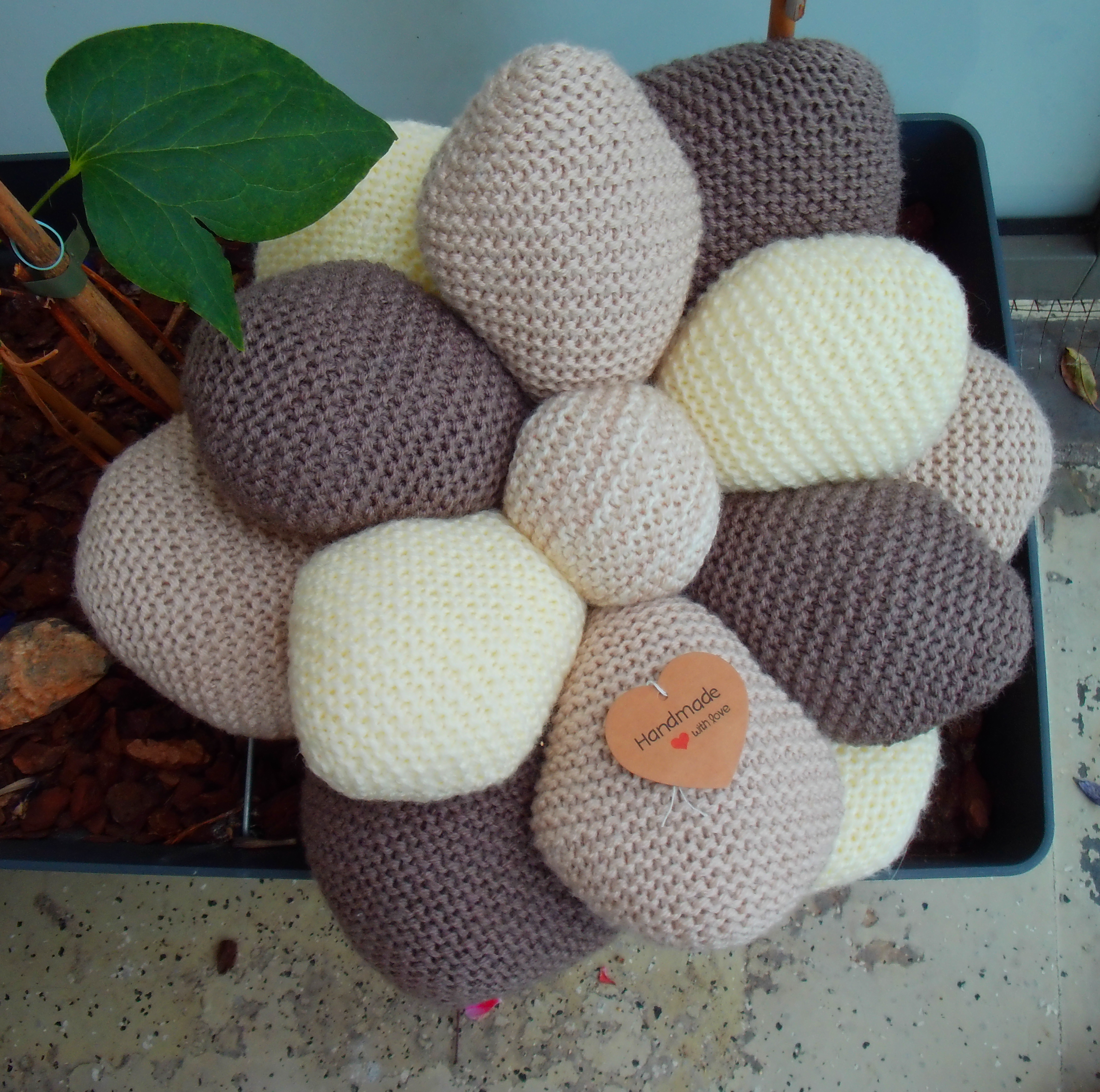 Beige, bruin getinte sierkussen