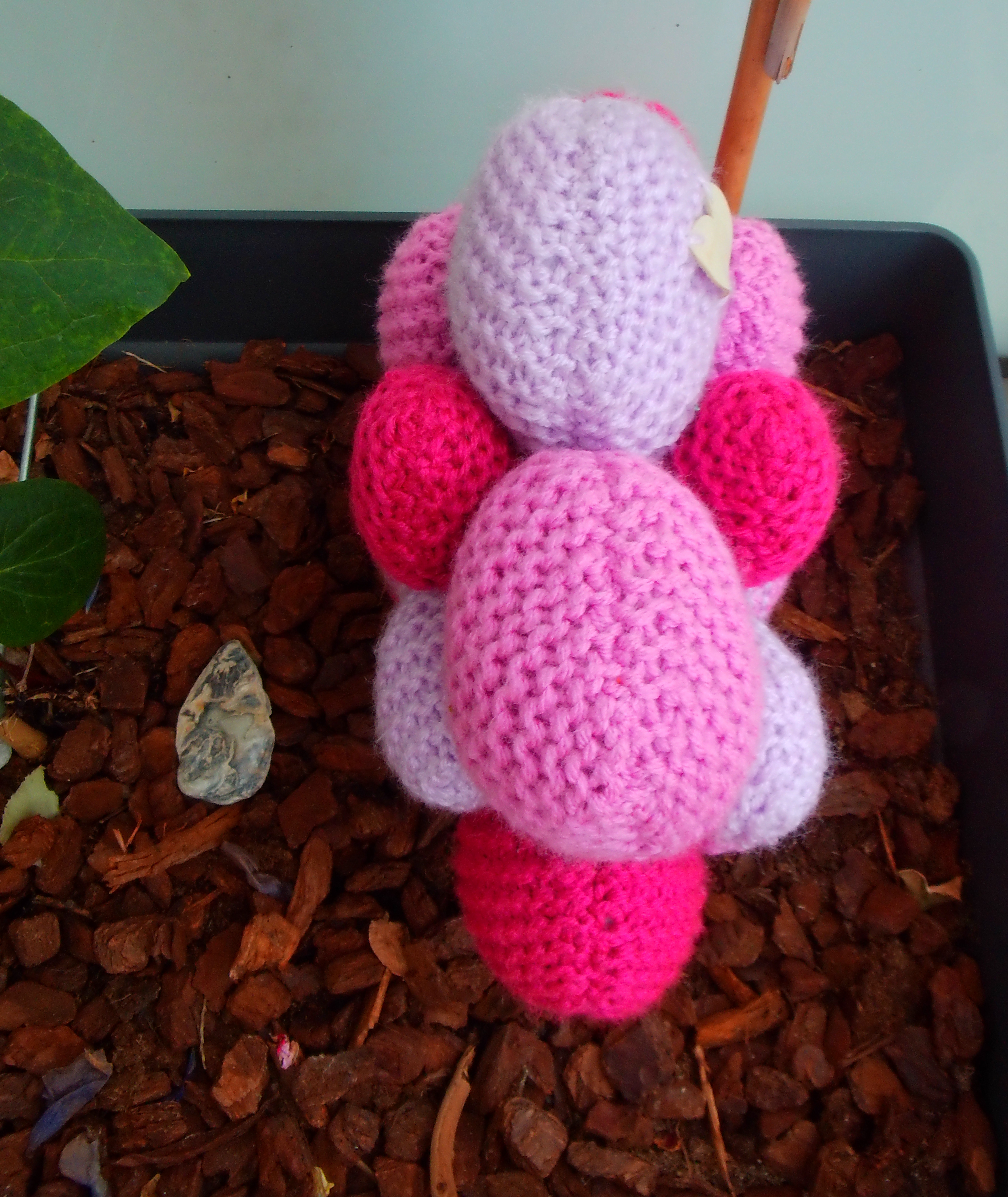 Roze getinte bloemkussen
