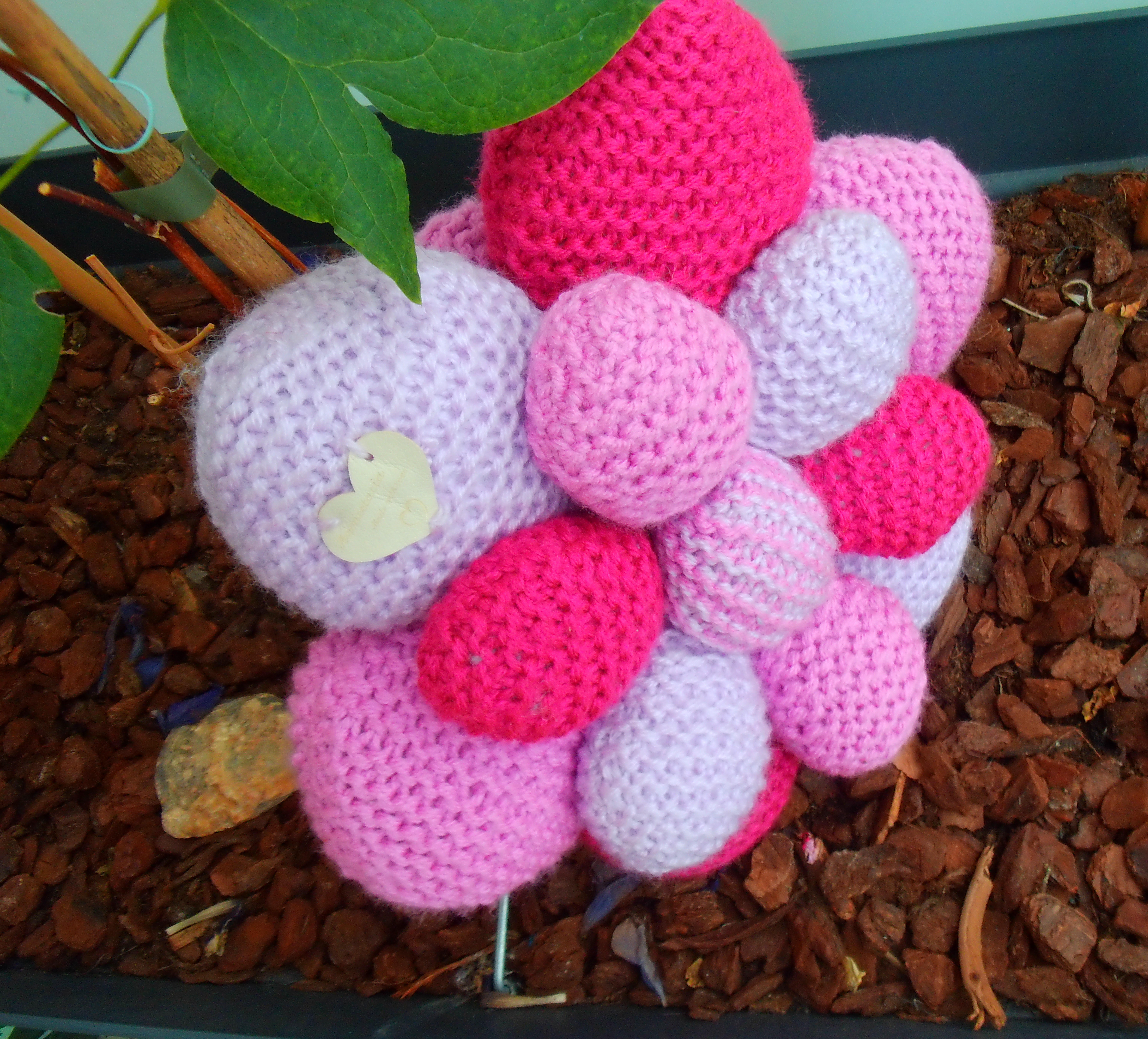 Pink tinted flower cushion