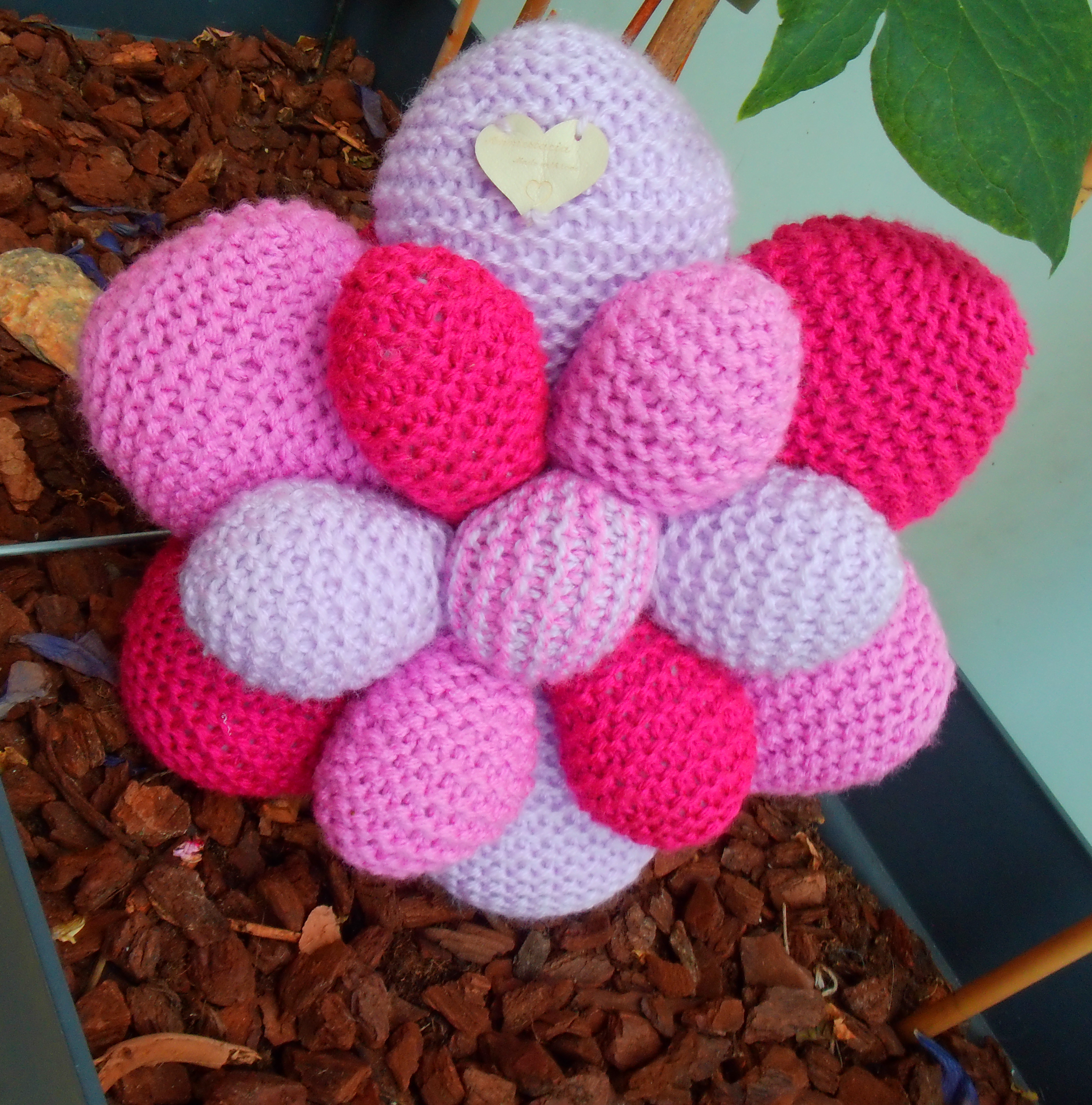 Pink tinted flower cushion