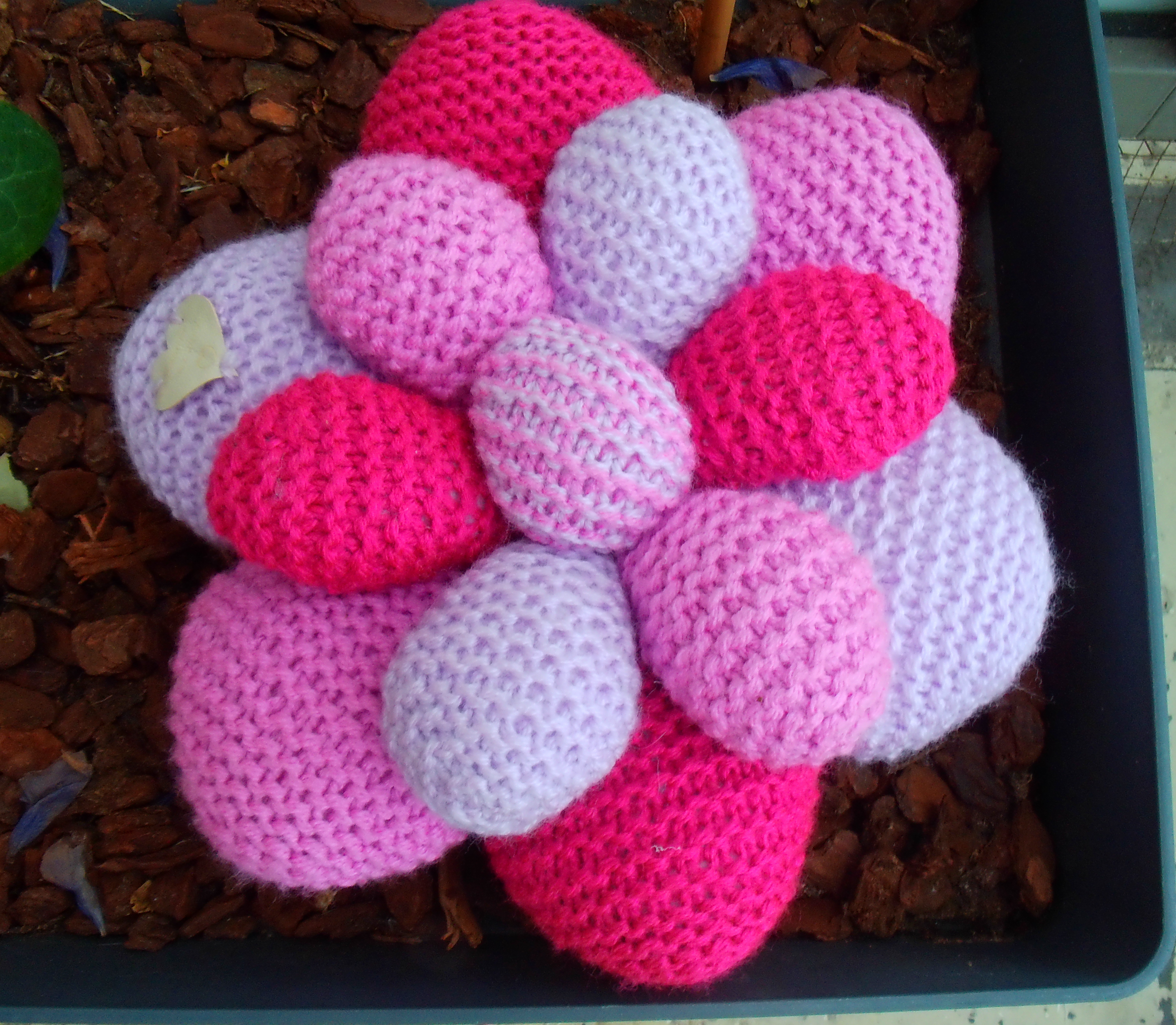 Pink tinted flower cushion