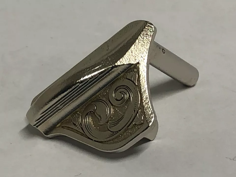 1911 laser engraved Thumb Safety satin nickel plated