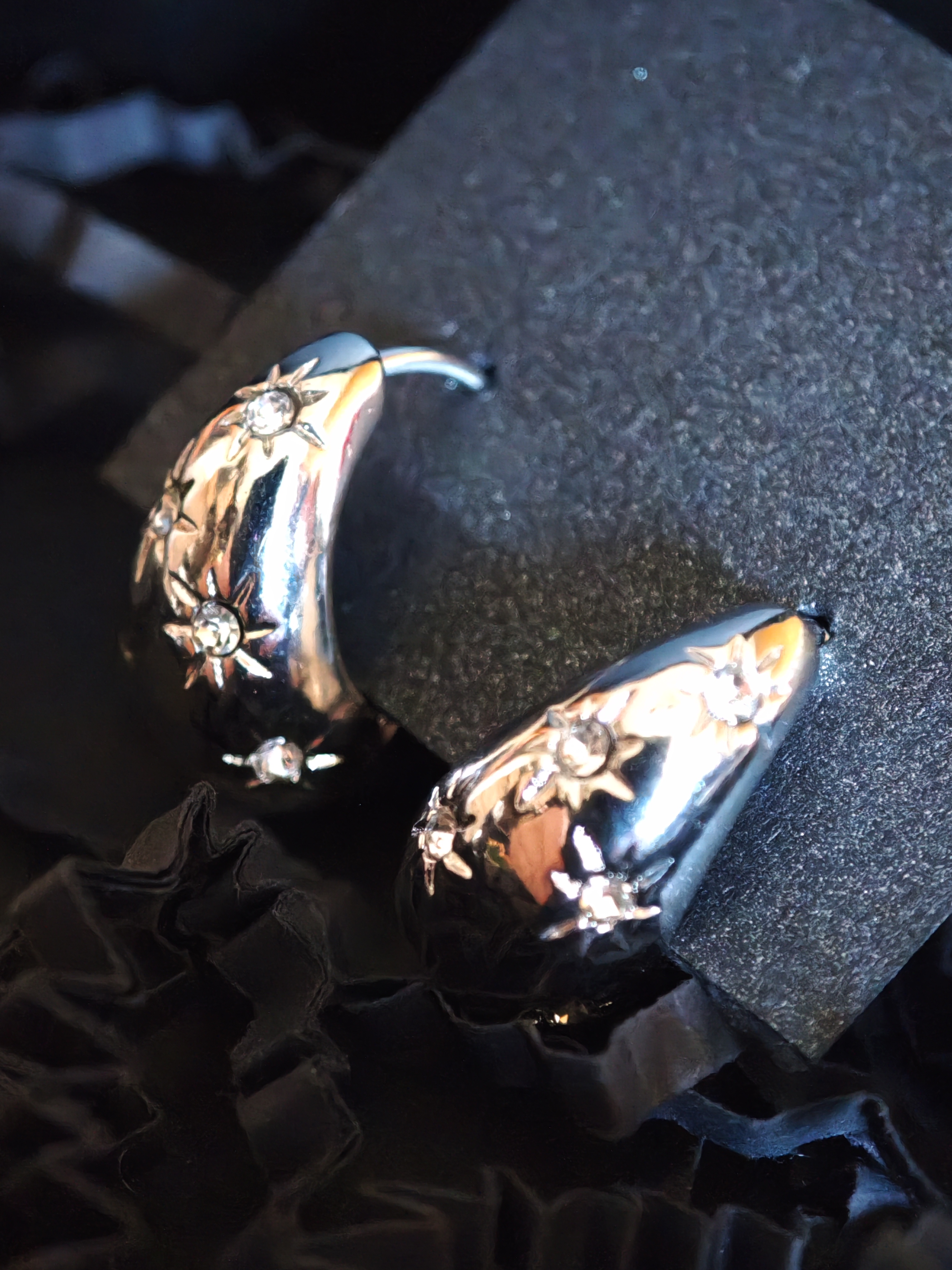 Sidabro spalvos auskarai