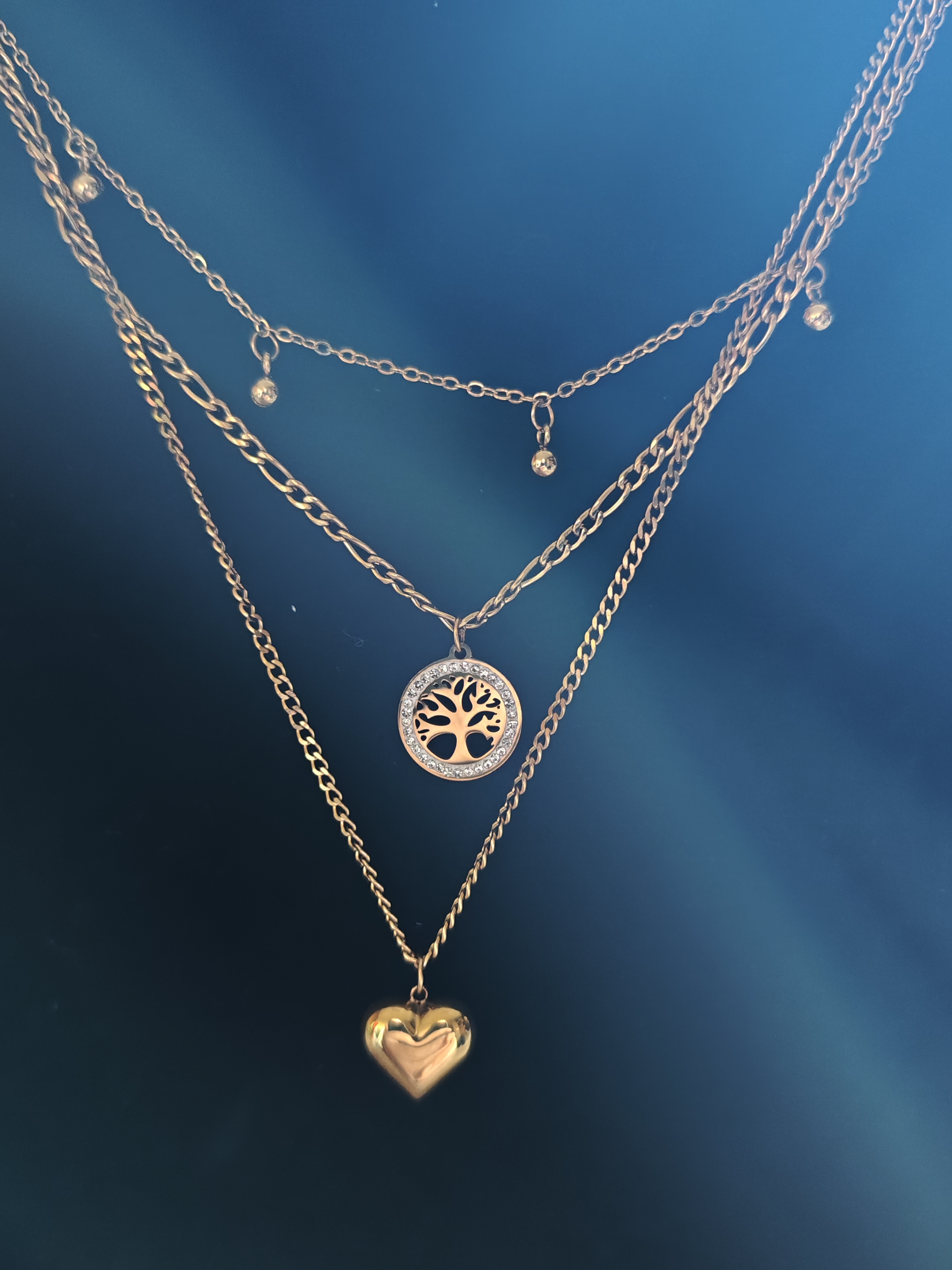 Kaklo papuošalas su gyvybės medžio ir širdies pakabukais