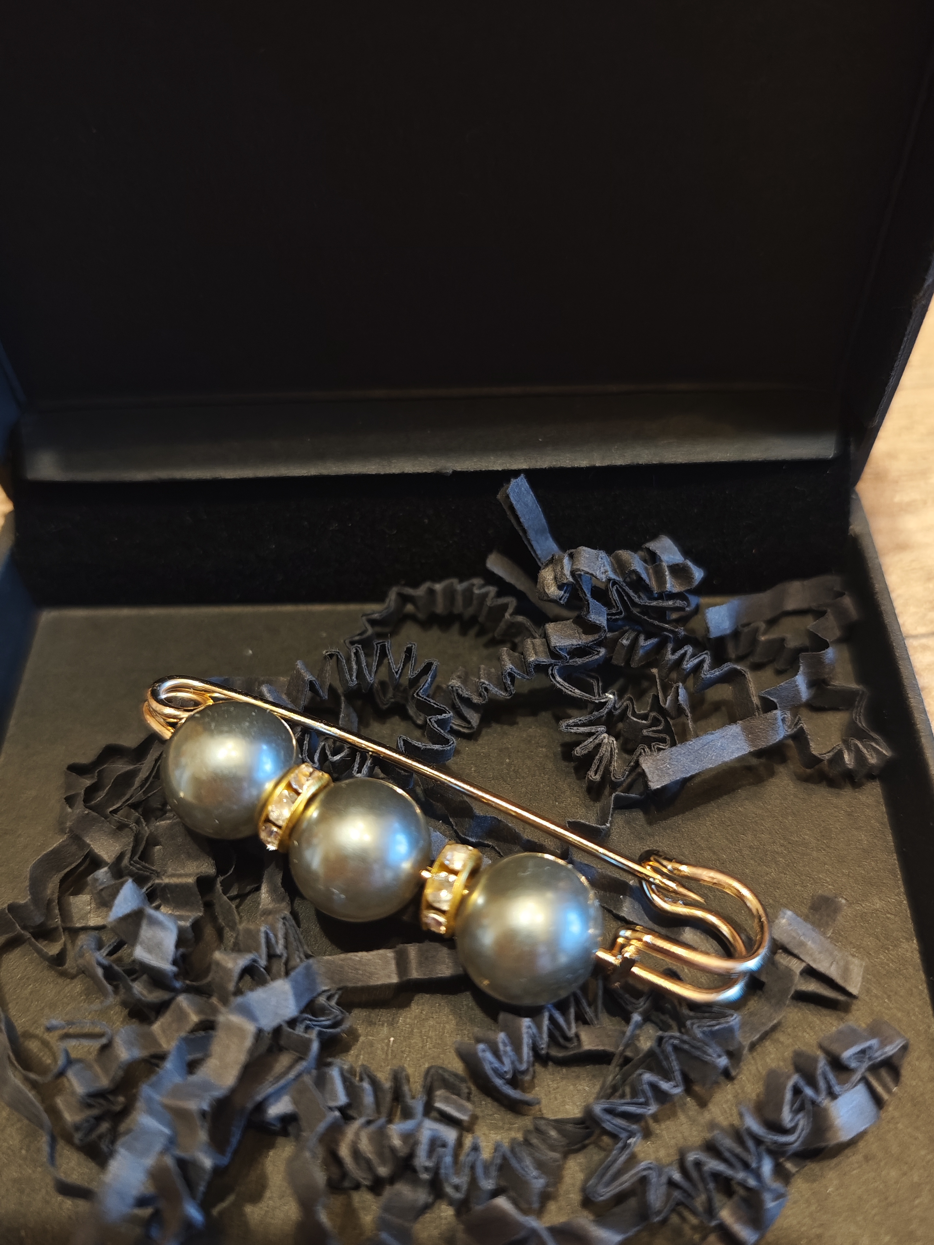 Smeigtukas su dirbtiniais perlais