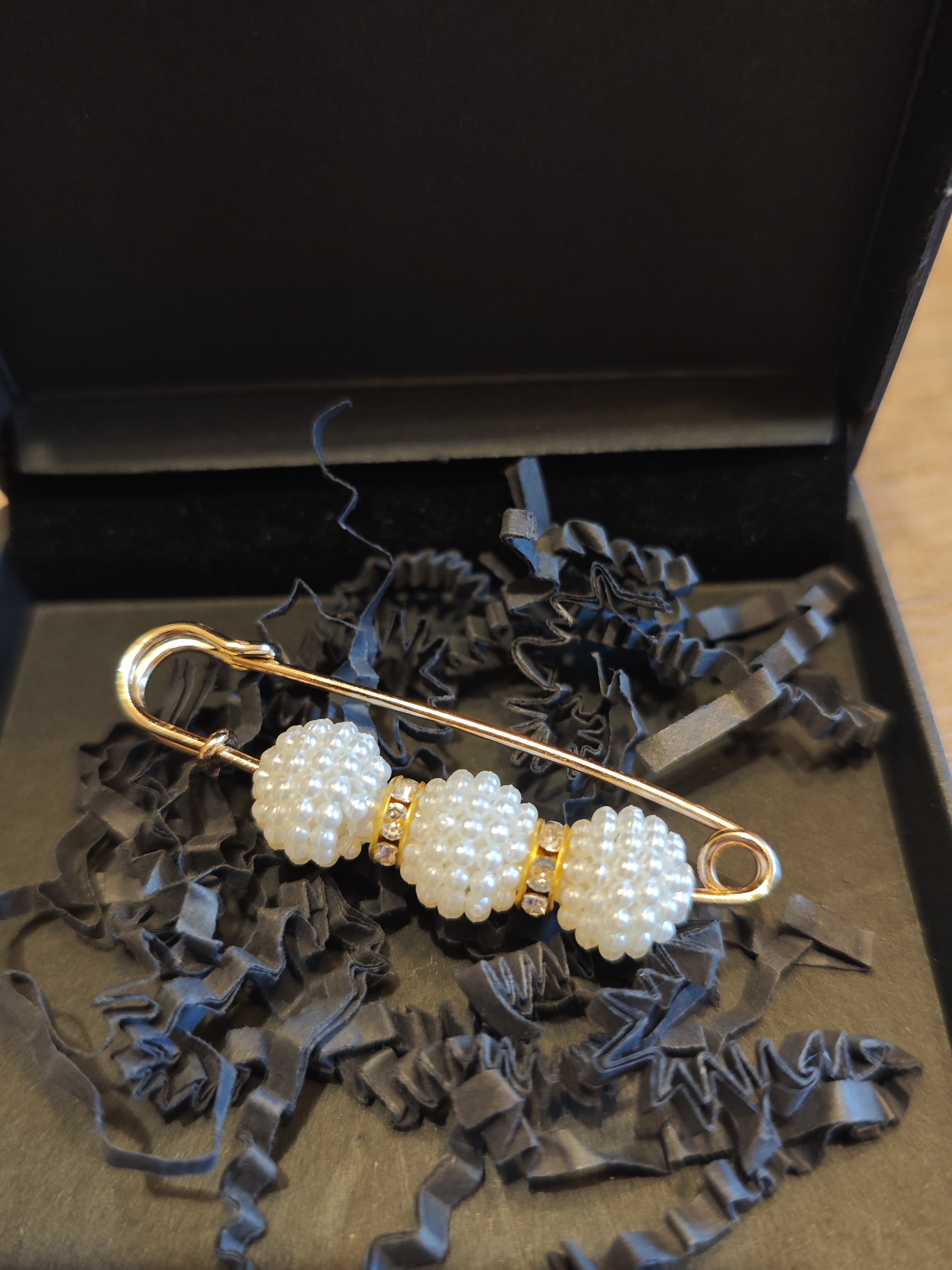 Smeigtukas su dirbtiniais perliukais