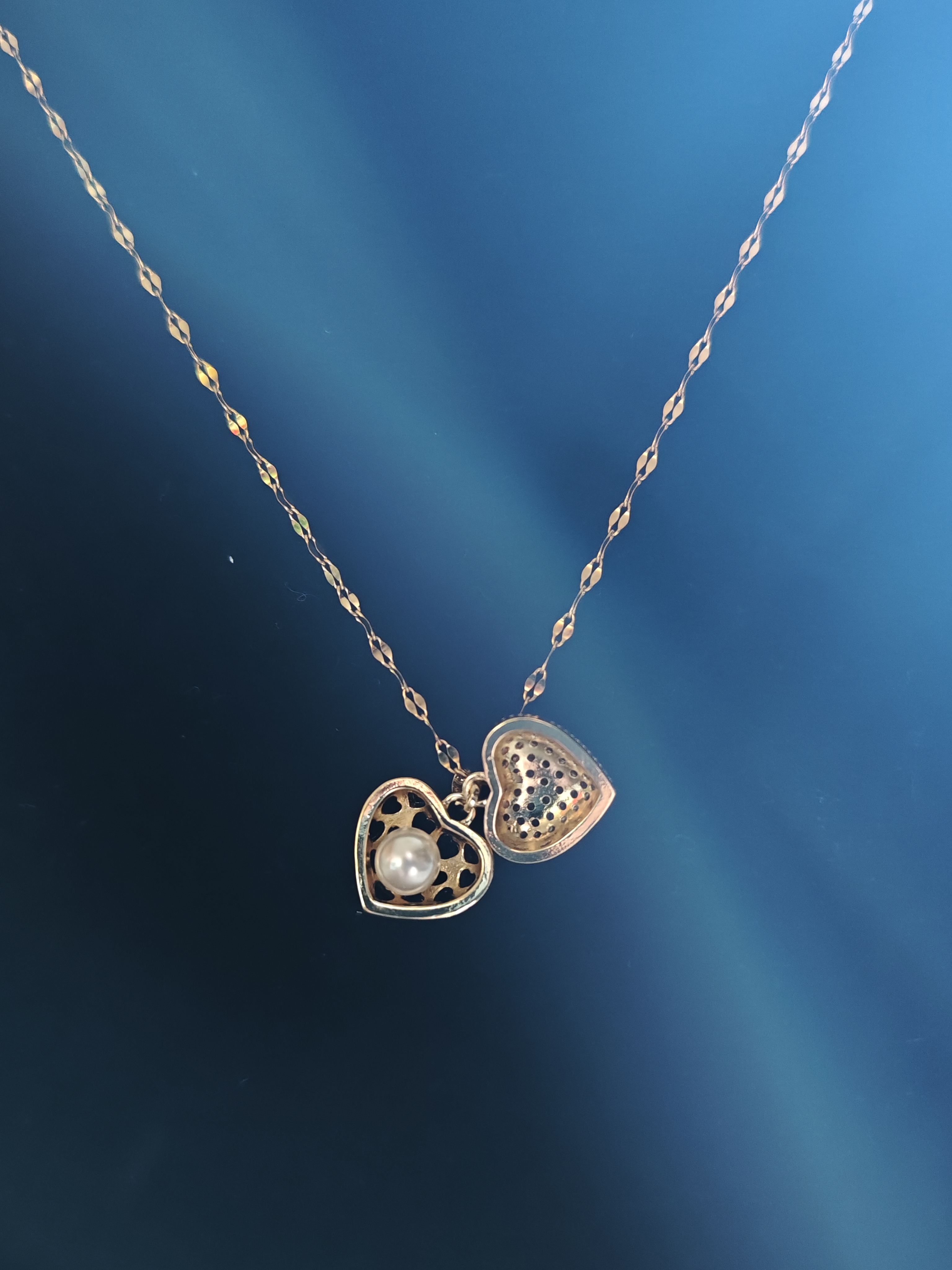 Kaklo papuošalas "Paslėptas perlas"