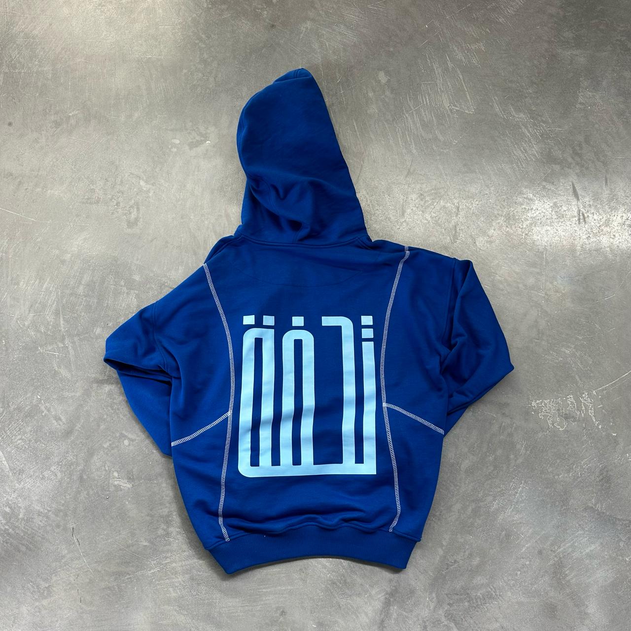 Tuhfa's blue hoodie
