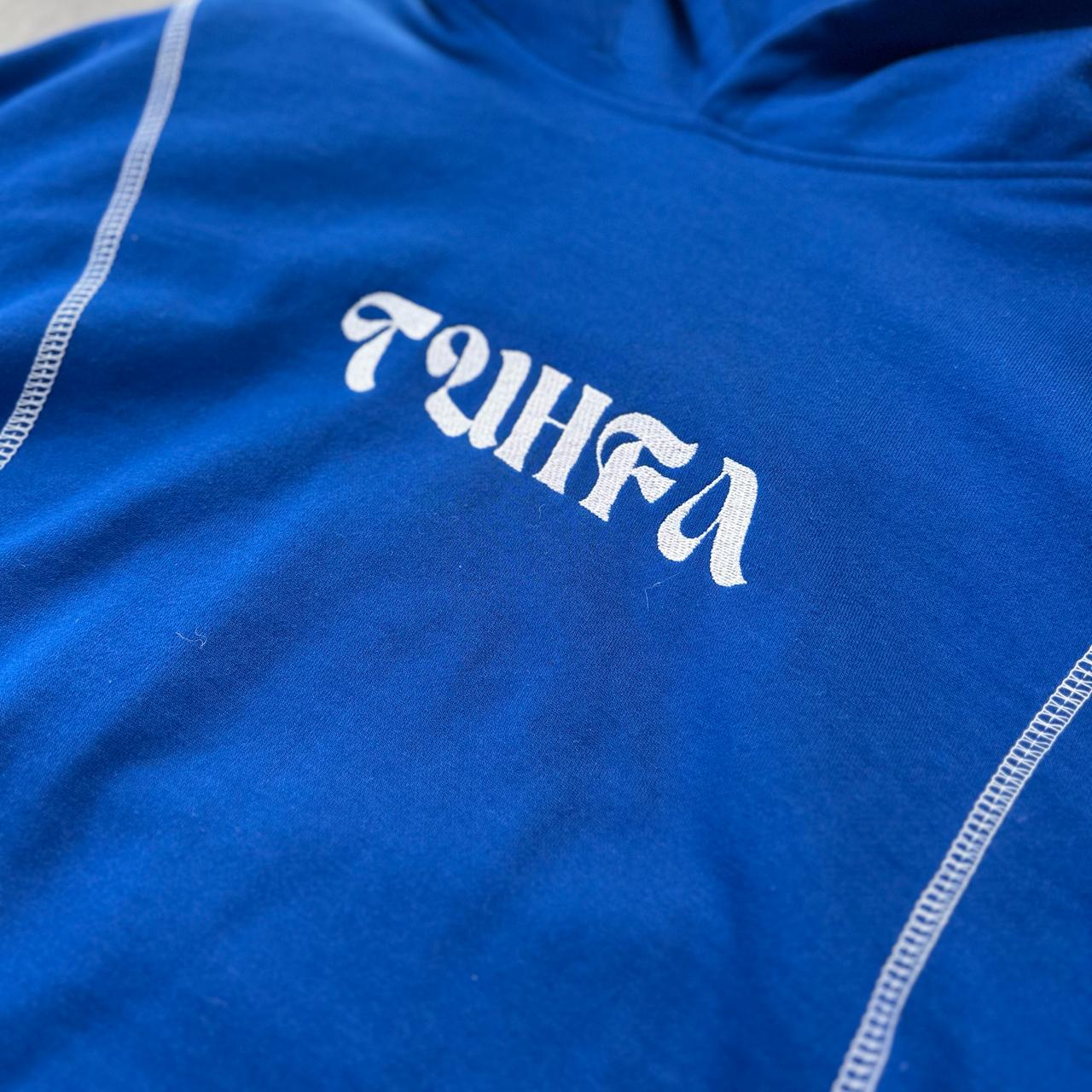 Tuhfa's blue hoodie