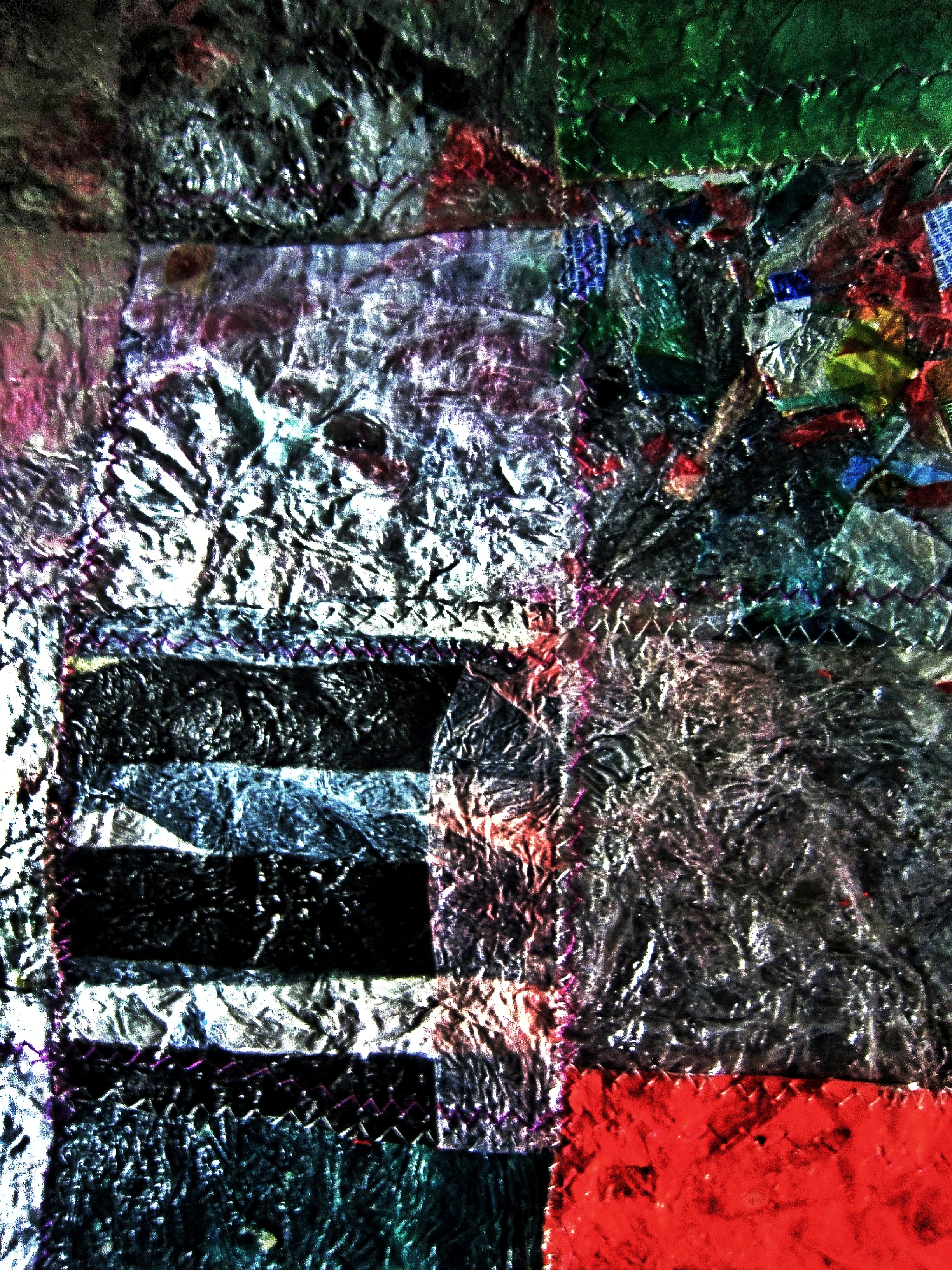 Recycled plastic metallic photo stock,Metallic art,Metallic patchwork art,Recycled plastic metallic,Glossy abstract art,Abstract metallic background,Sustainable metallic art.