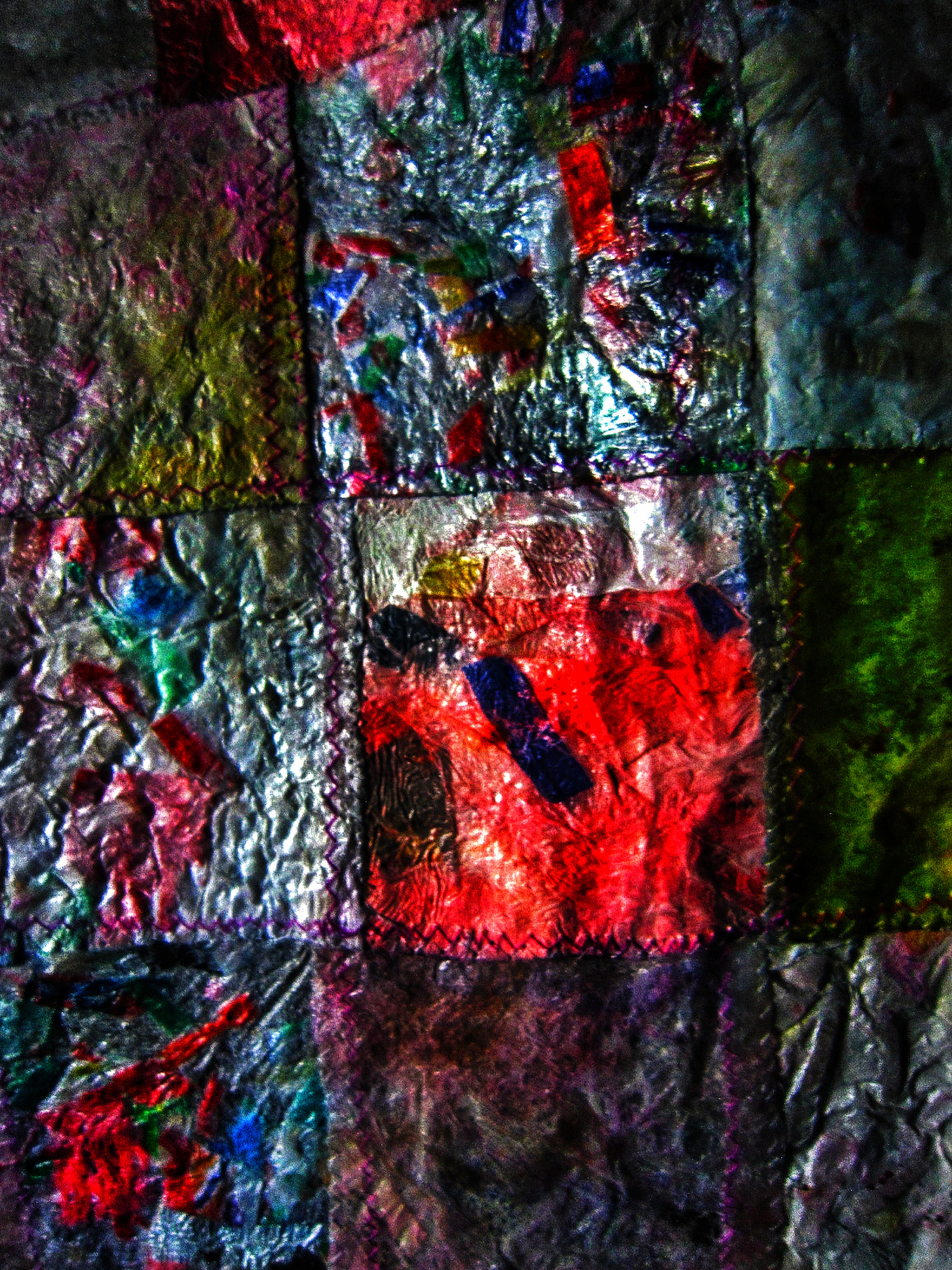 Recycled plastic metallic photo stock,Metallic art,Metallic patchwork art,Recycled plastic metallic,Glossy abstract art,Abstract metallic background,Sustainable metallic art.