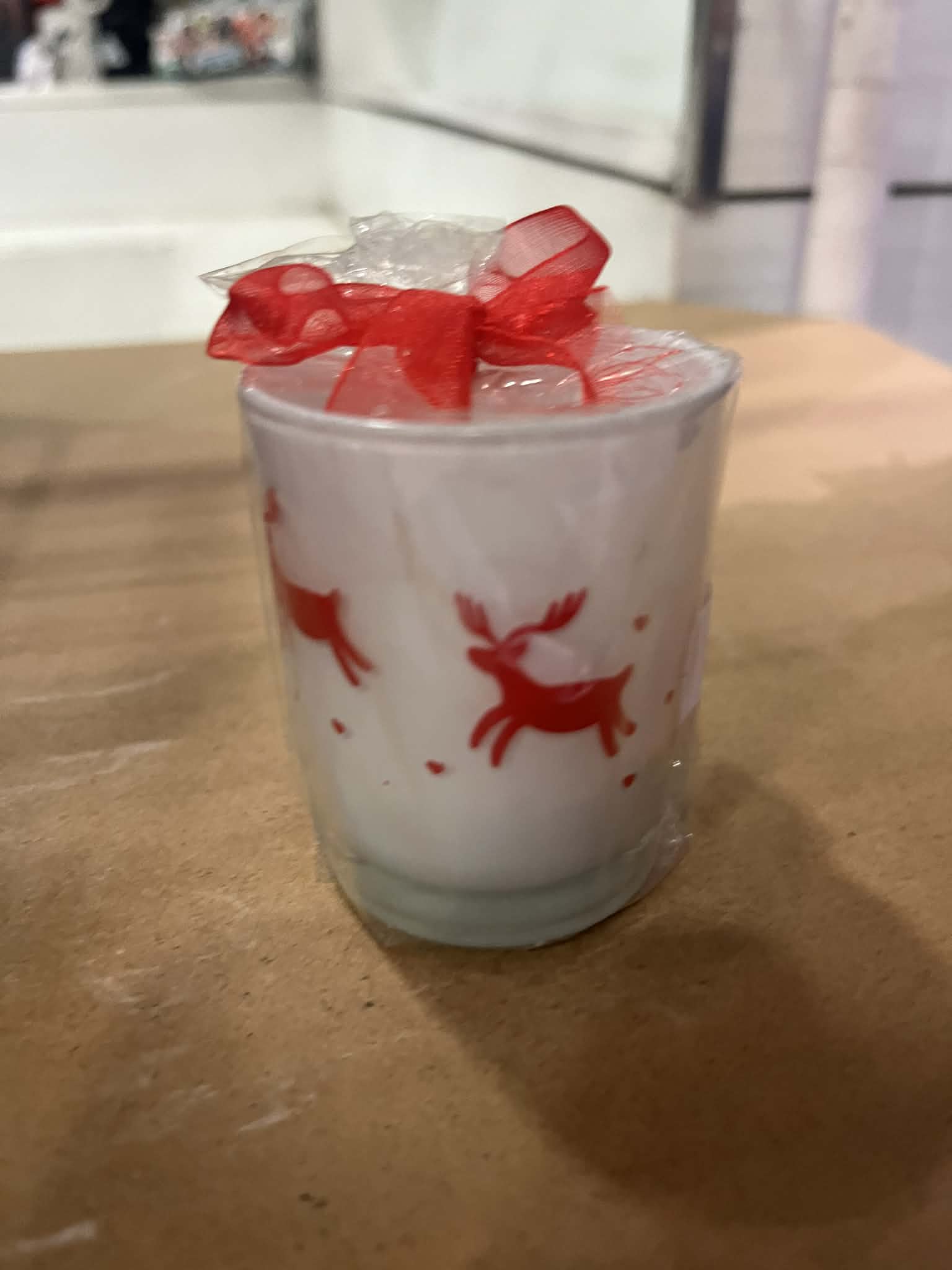Holiday-themed scented candle