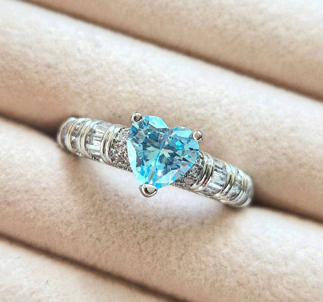 Heart-shaped blue gemstone ring