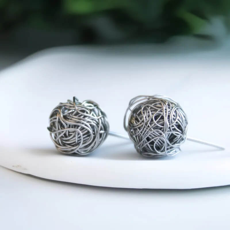 Brinco Fios Trançados