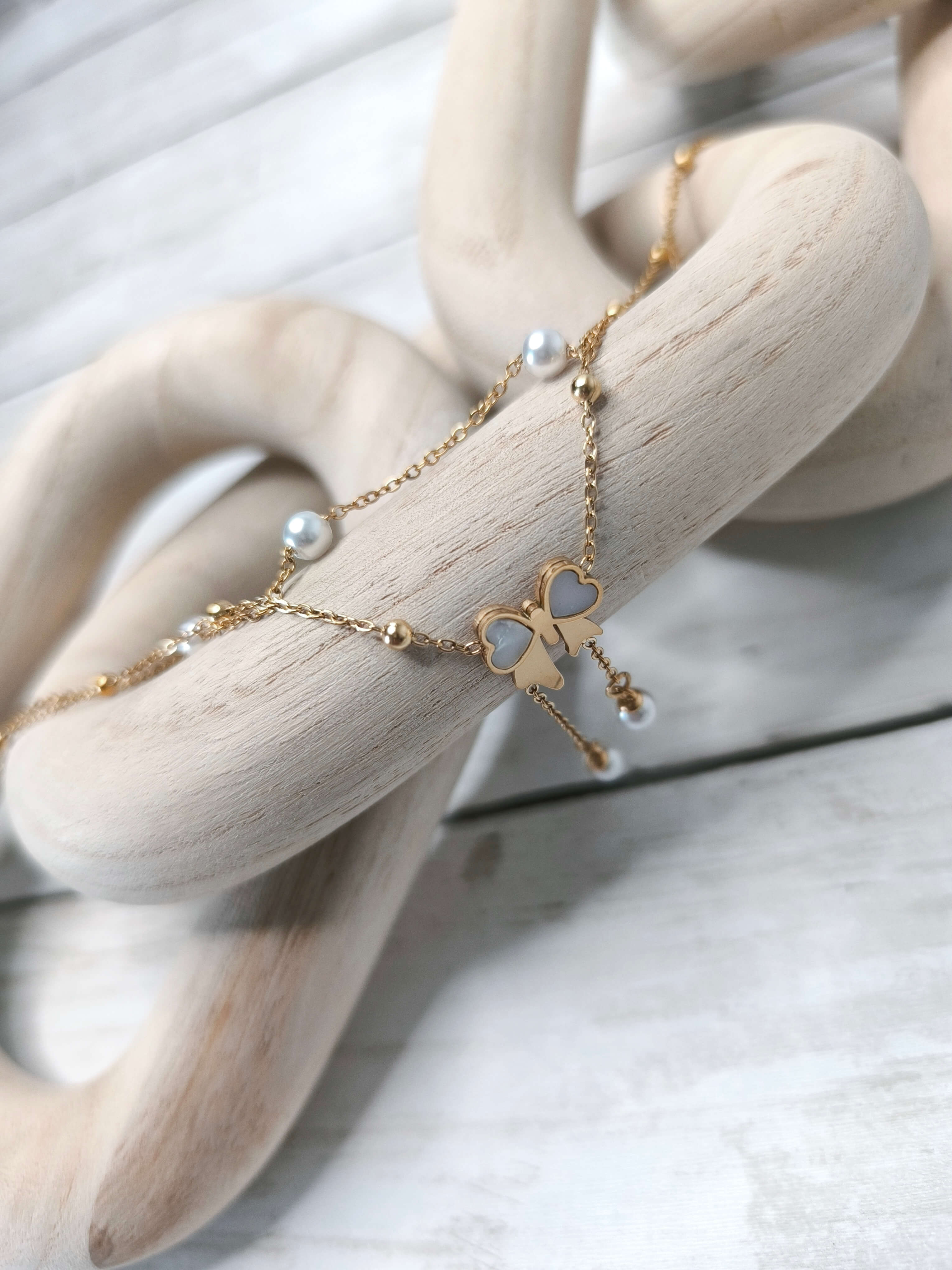 CHAINE DE CHEVILLE FEMME - DOREE - NOEUD EN ACIER INOXYDABLE