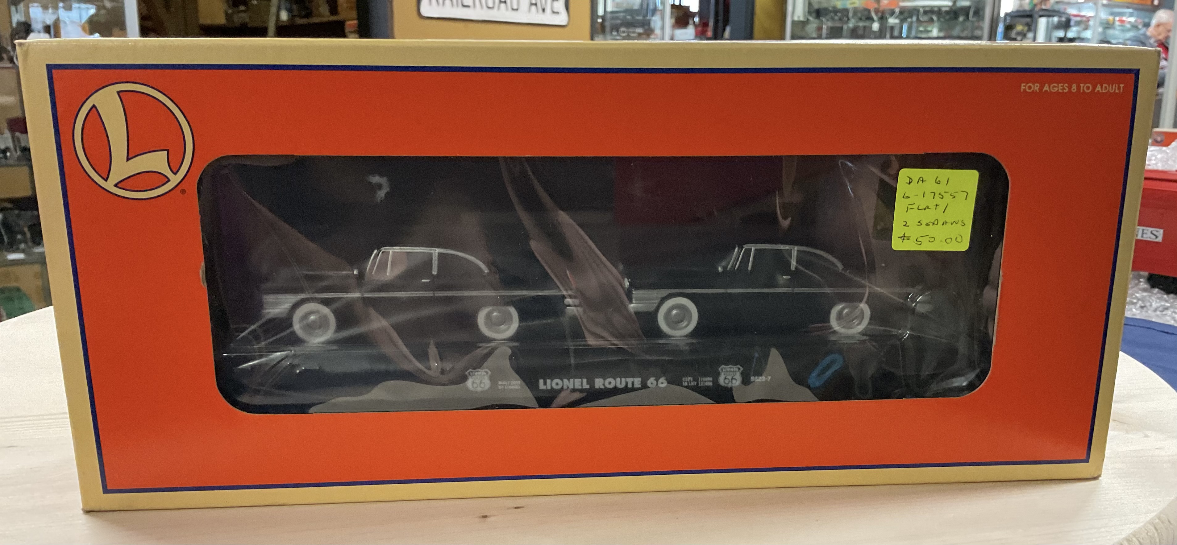 NOS (new old stock) Lionel 6-17557 O-Scale Route 66 Flat Car with 2 Black Sedans