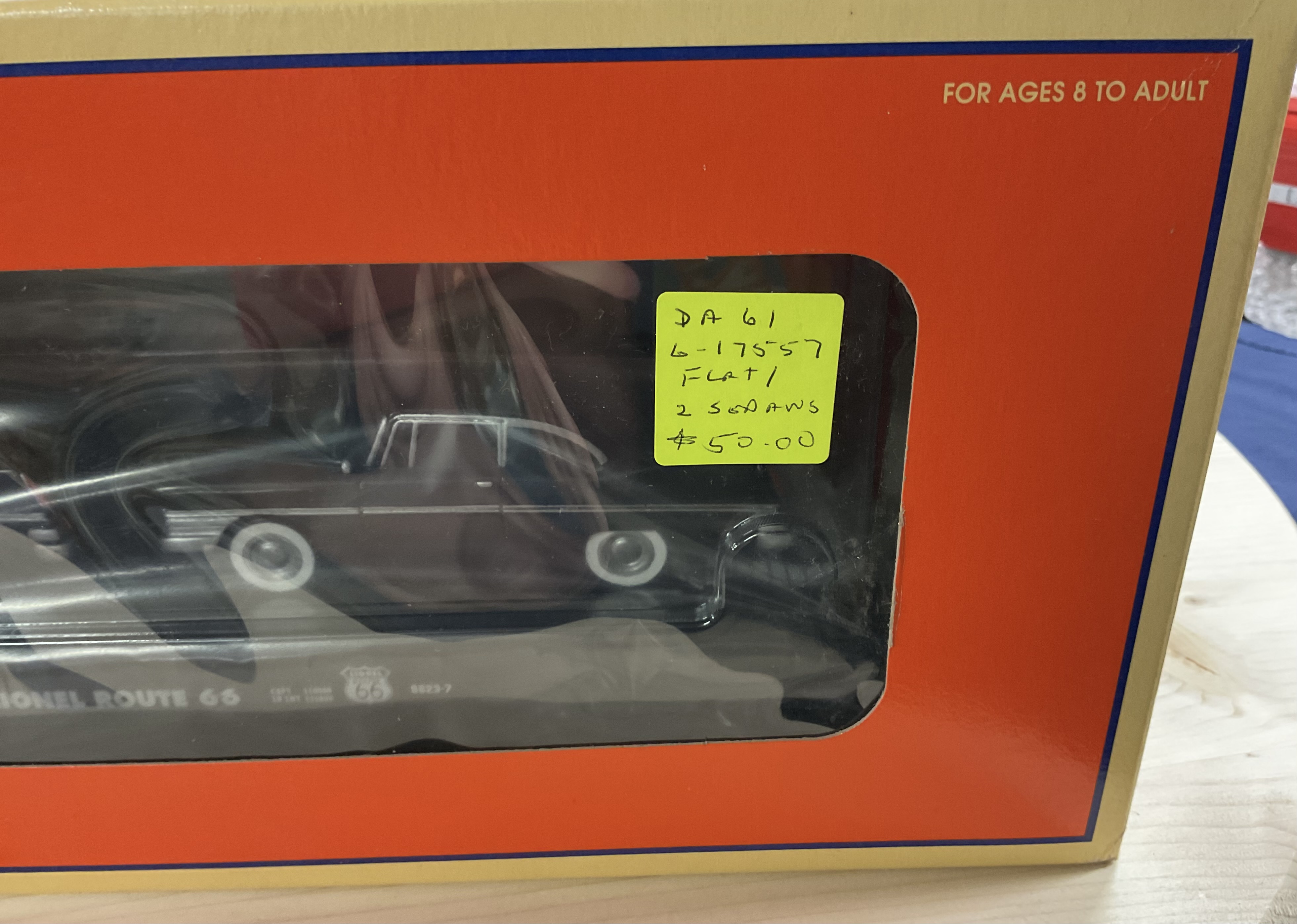 NOS (new old stock) Lionel 6-17557 O-Scale Route 66 Flat Car with 2 Black Sedans