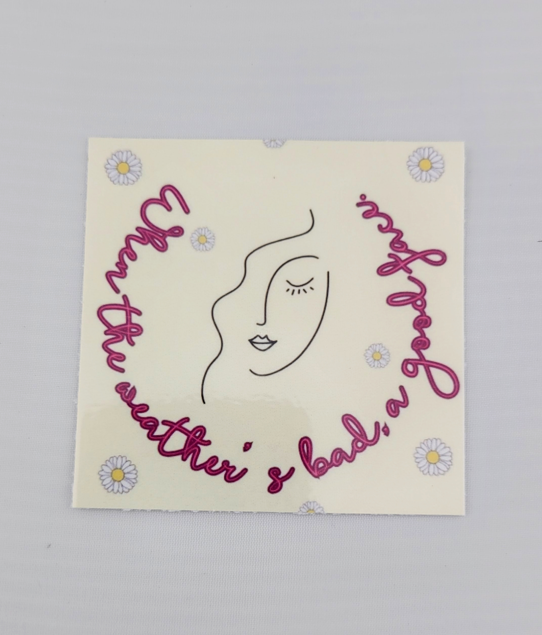 Inspirational Sticker- when the weather's bad, a good face.