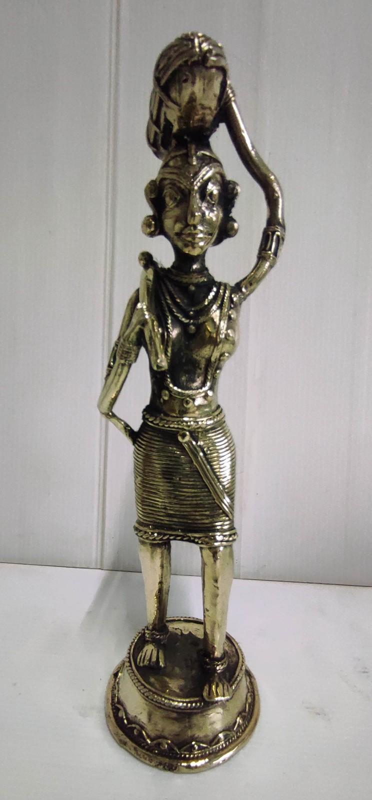 Brass Sculpture of a Tribal Woman in Ethnic Dress