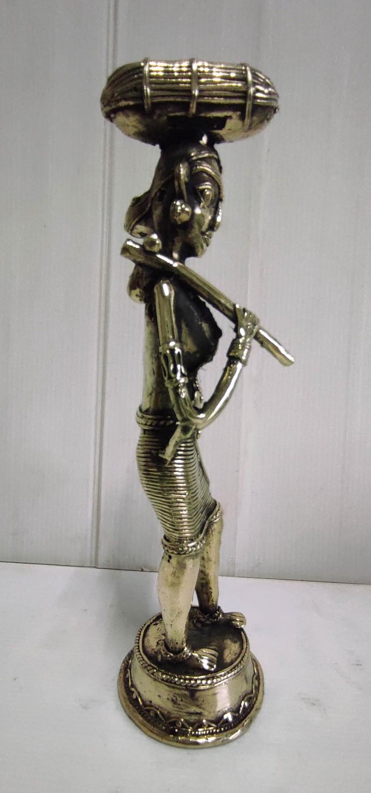 Brass Sculpture of a Tribal Woman in Ethnic Dress