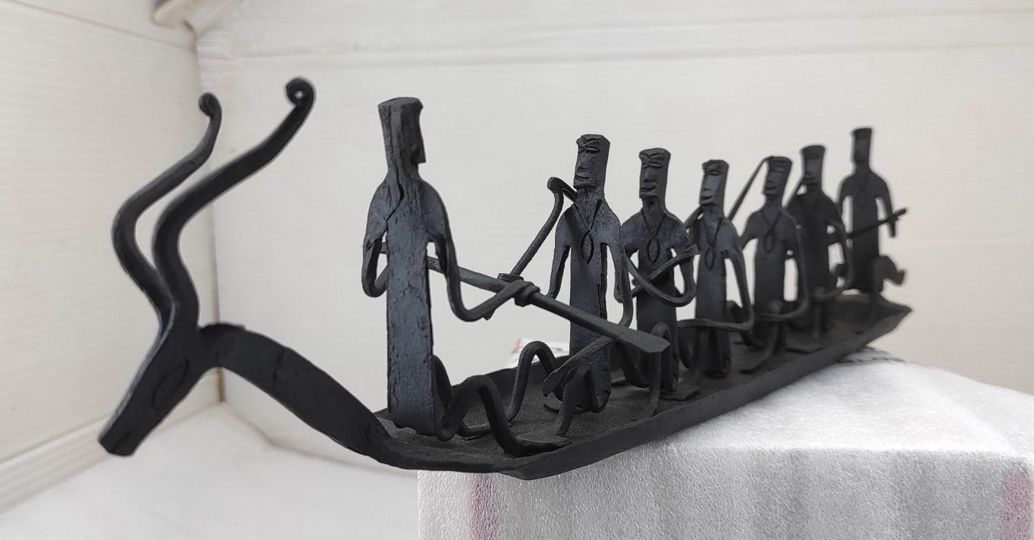 Handcrafted Iron Boat with Deer Head & 7 Seated Figures
