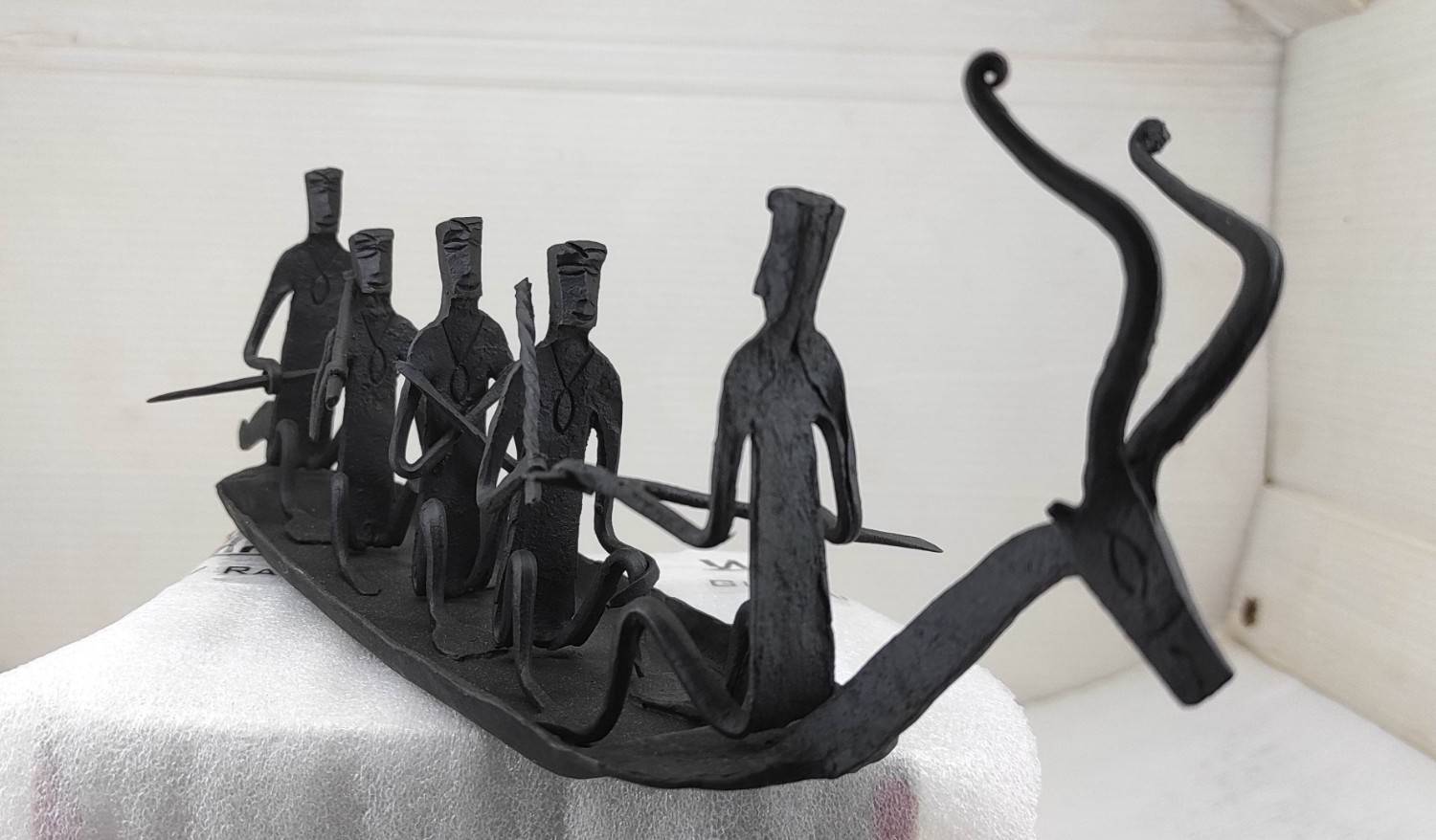 Handcrafted Tribal Iron Boat with Deer Head & Seated five Figures