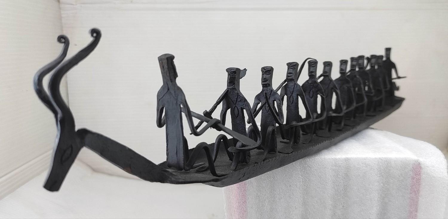 Handcrafted Iron Boat with Deer Head & 12 Seated Figures