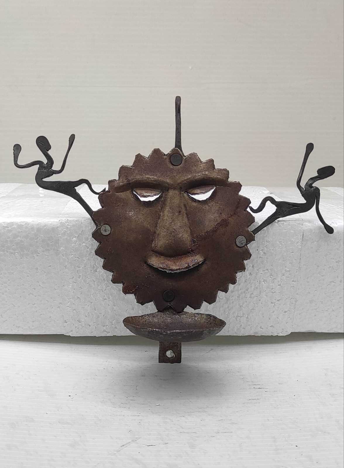 Iron Oil Lamp with Sun Face & Two Tribal Figures