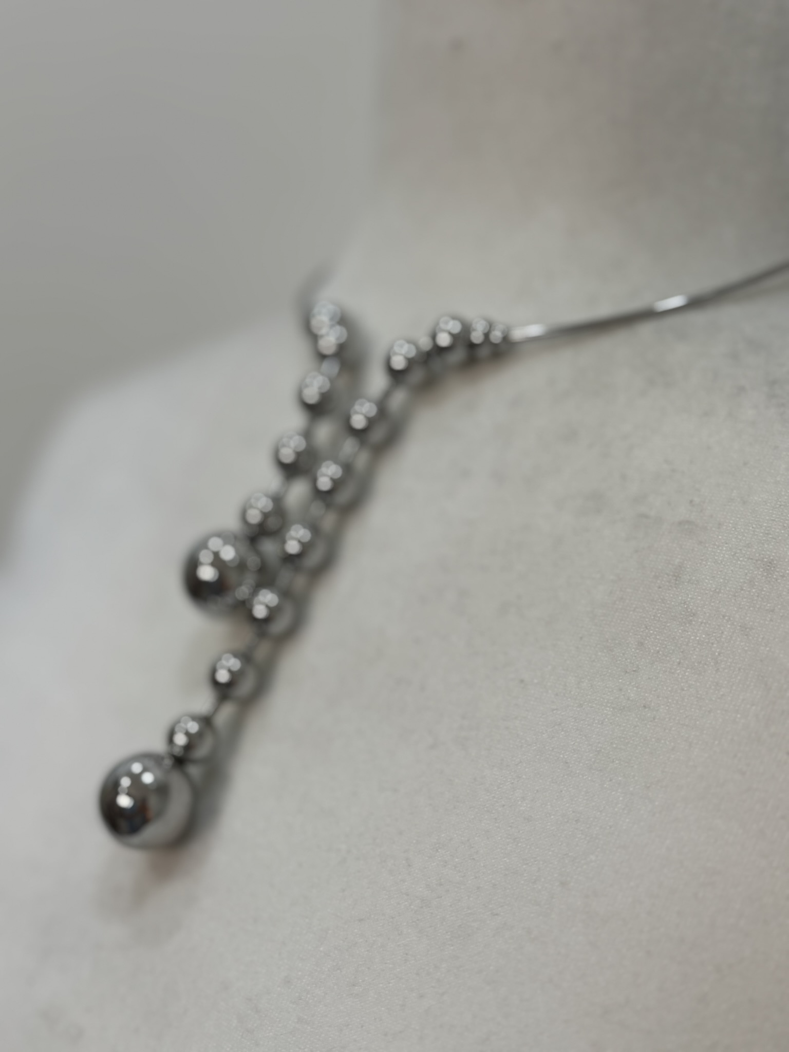 Collar bolas dos alturas