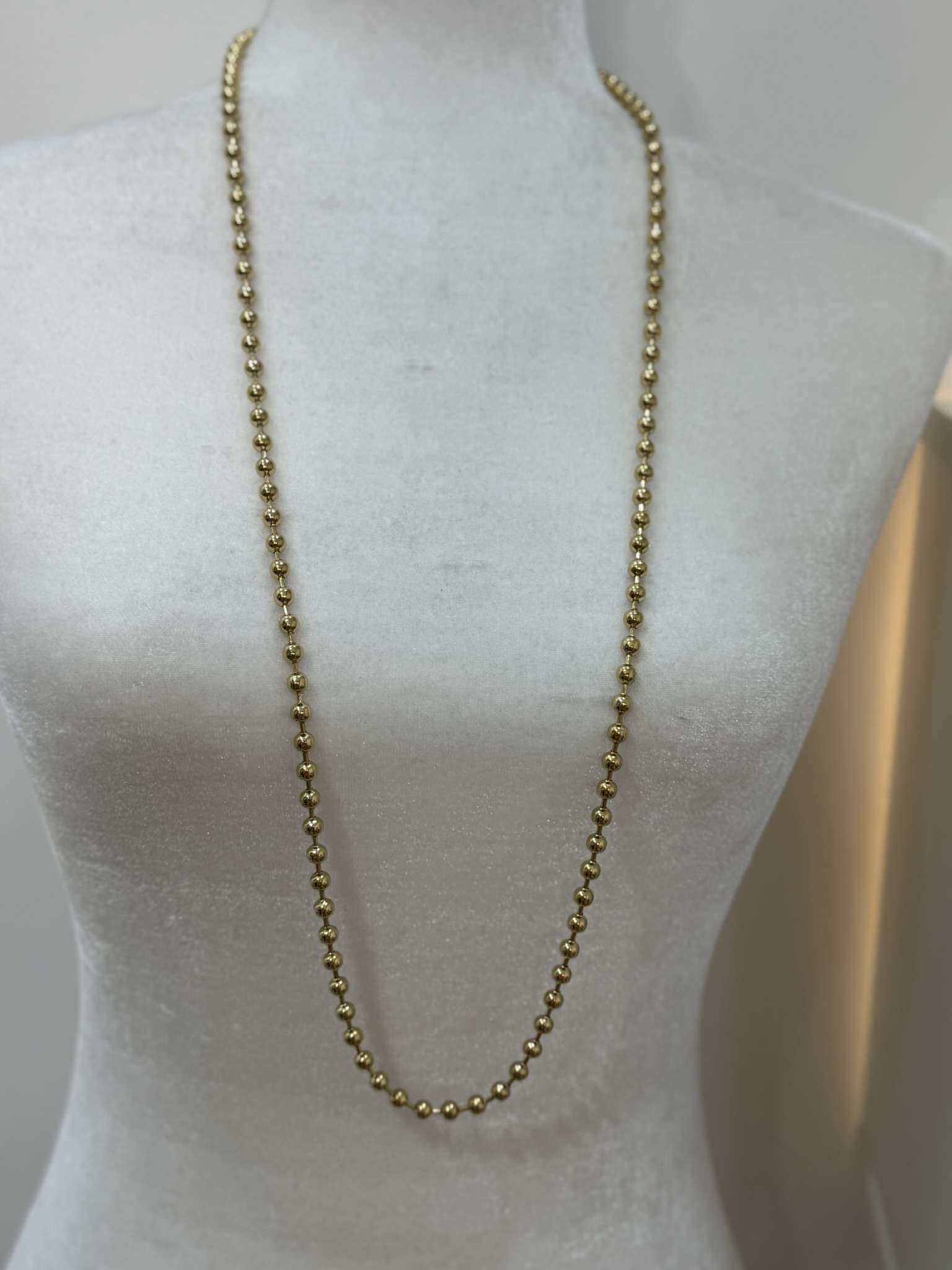 Collar  bolitas doradas