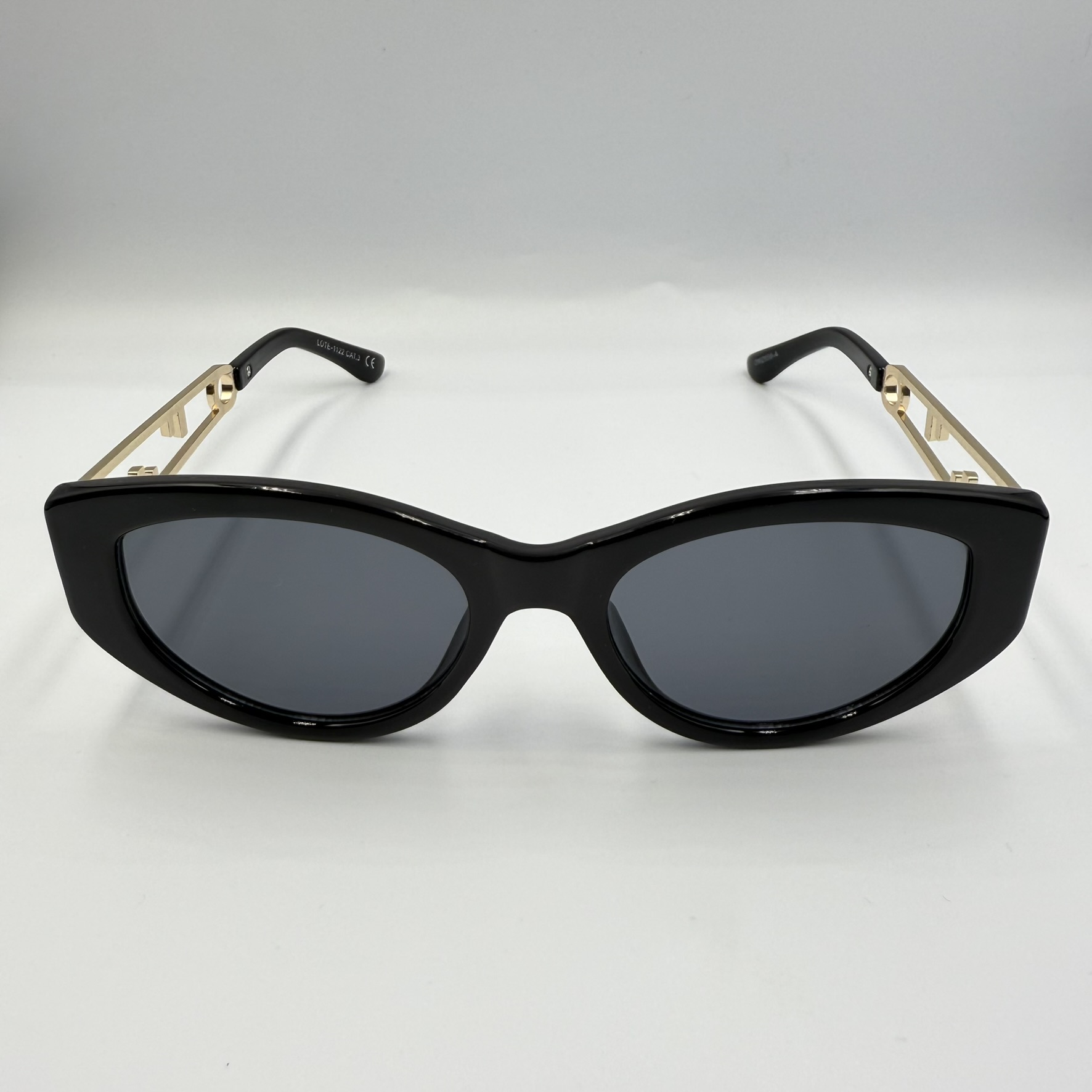 Gafas de sol patilla dorada