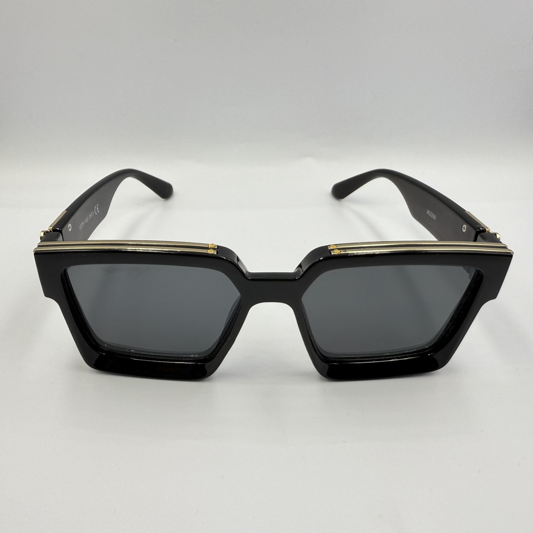 Gafas de sol marco superior dorado