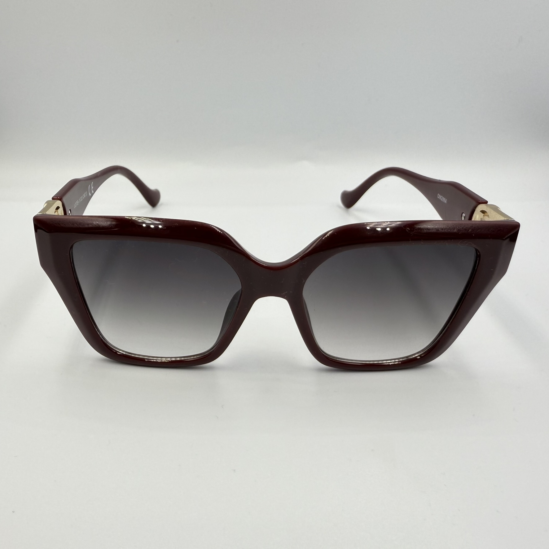 Gafas de sol granate H dorada