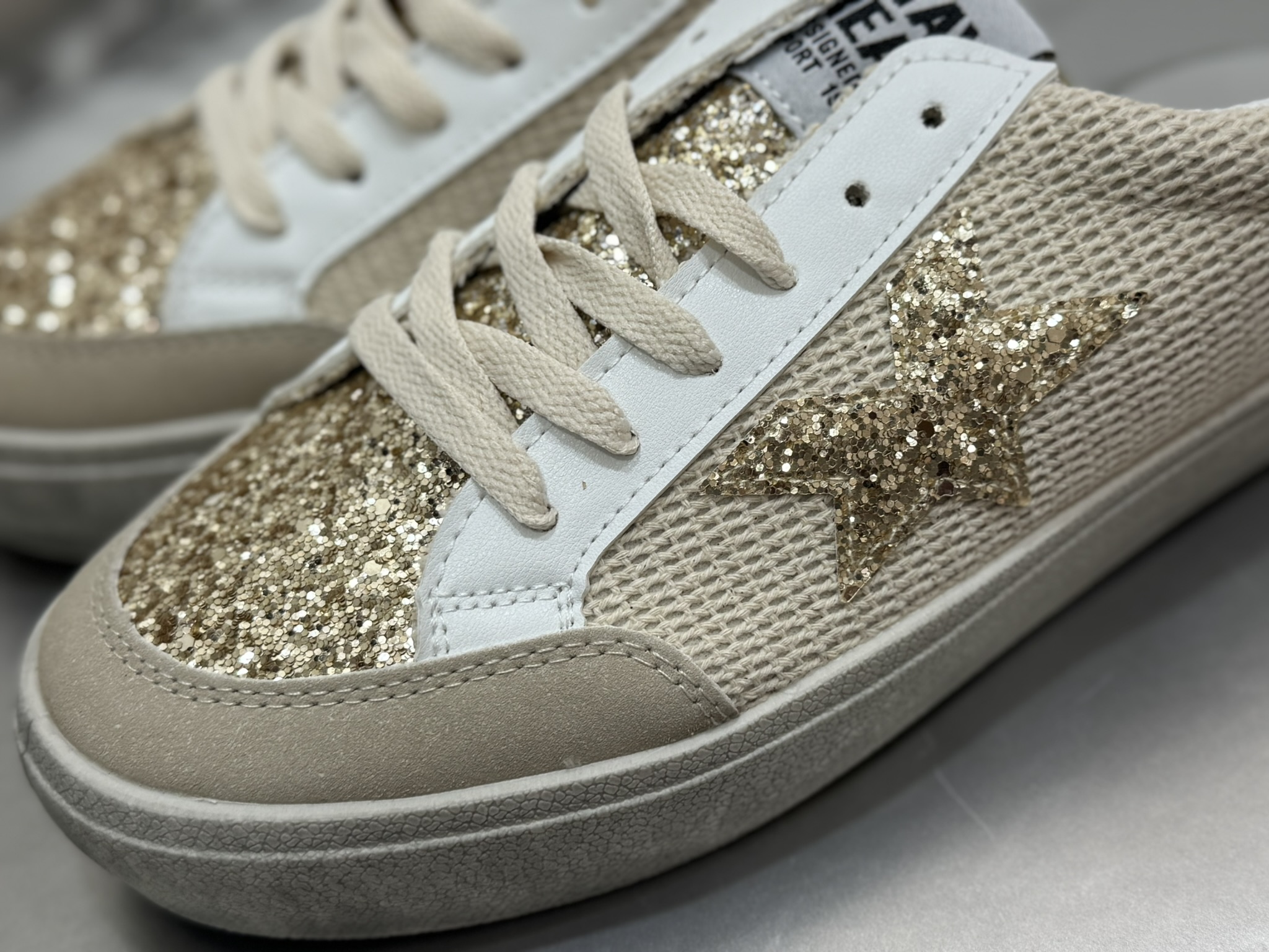 Zapatilla estrella brillos beige