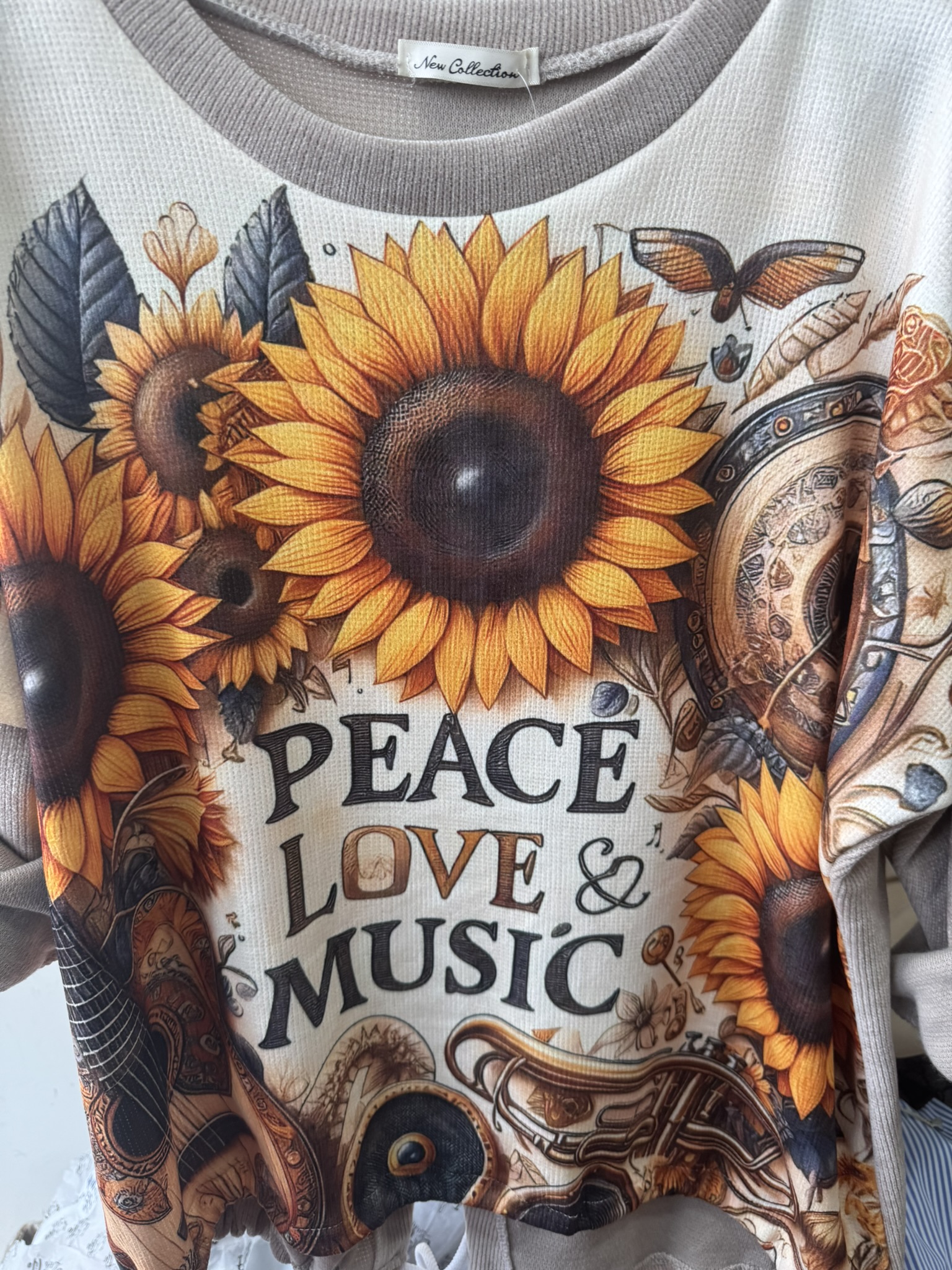 Sudadera letras girasol