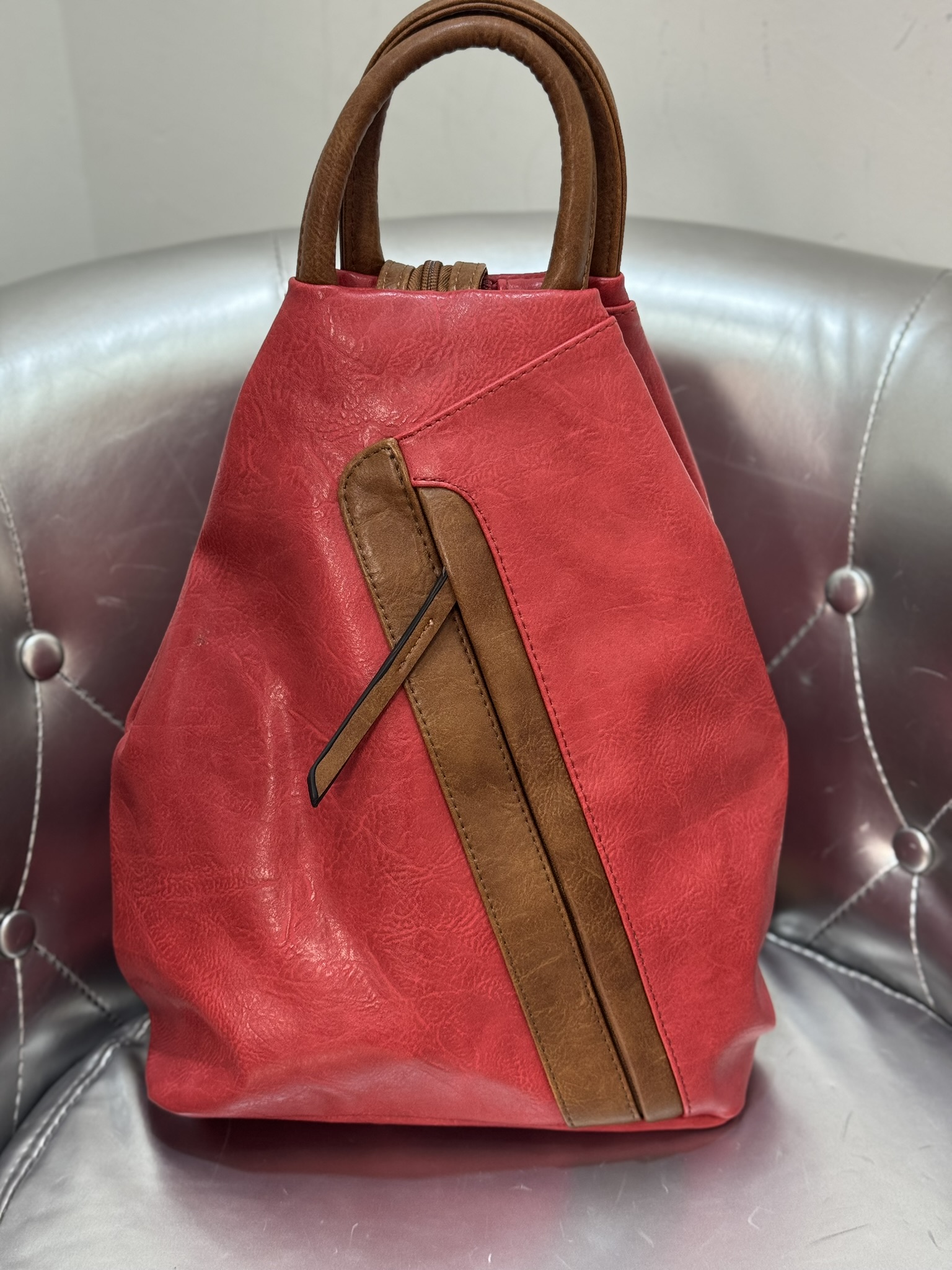 Mochila cremallera cruzada