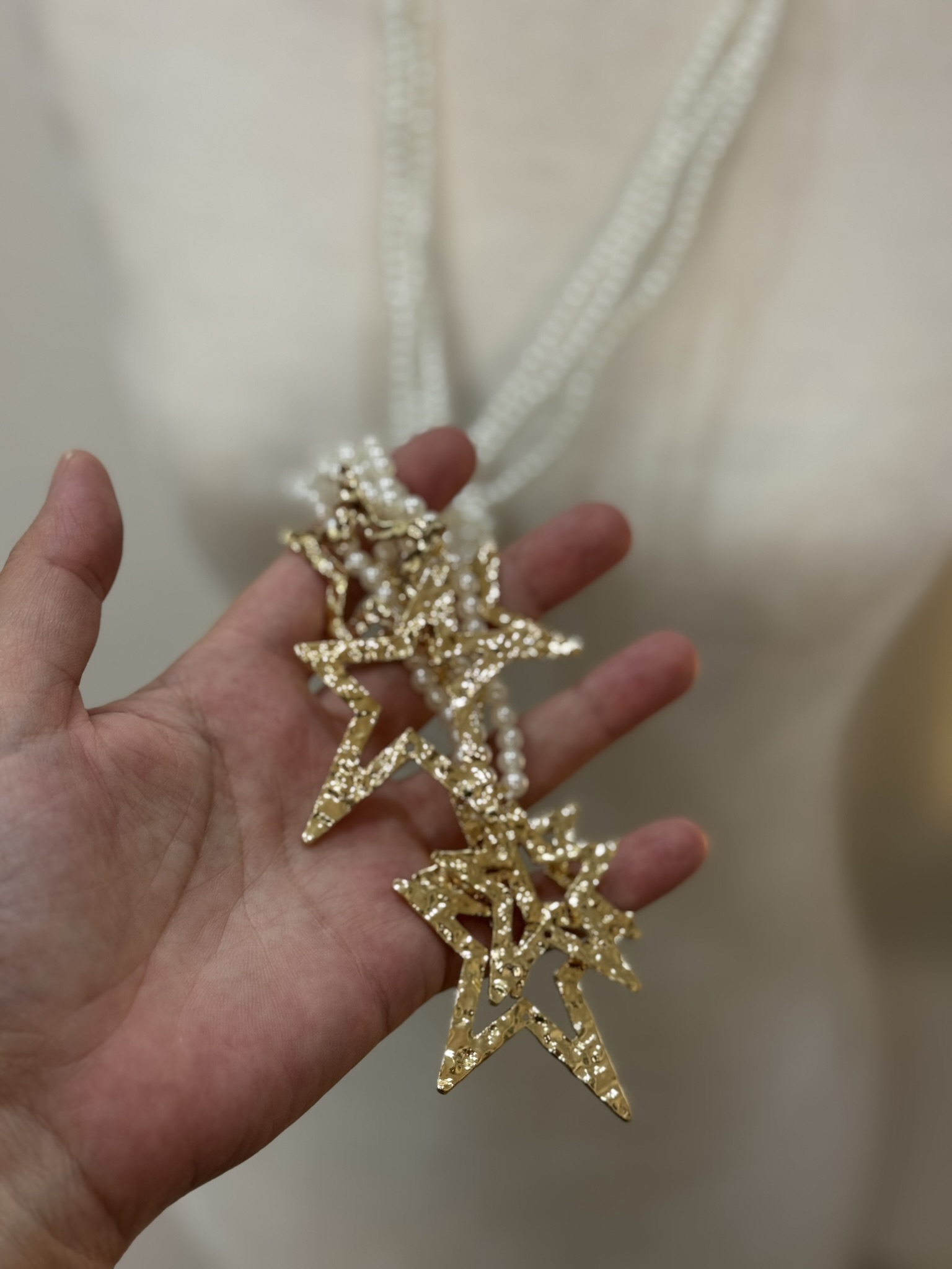 Colla perlas y estrellas