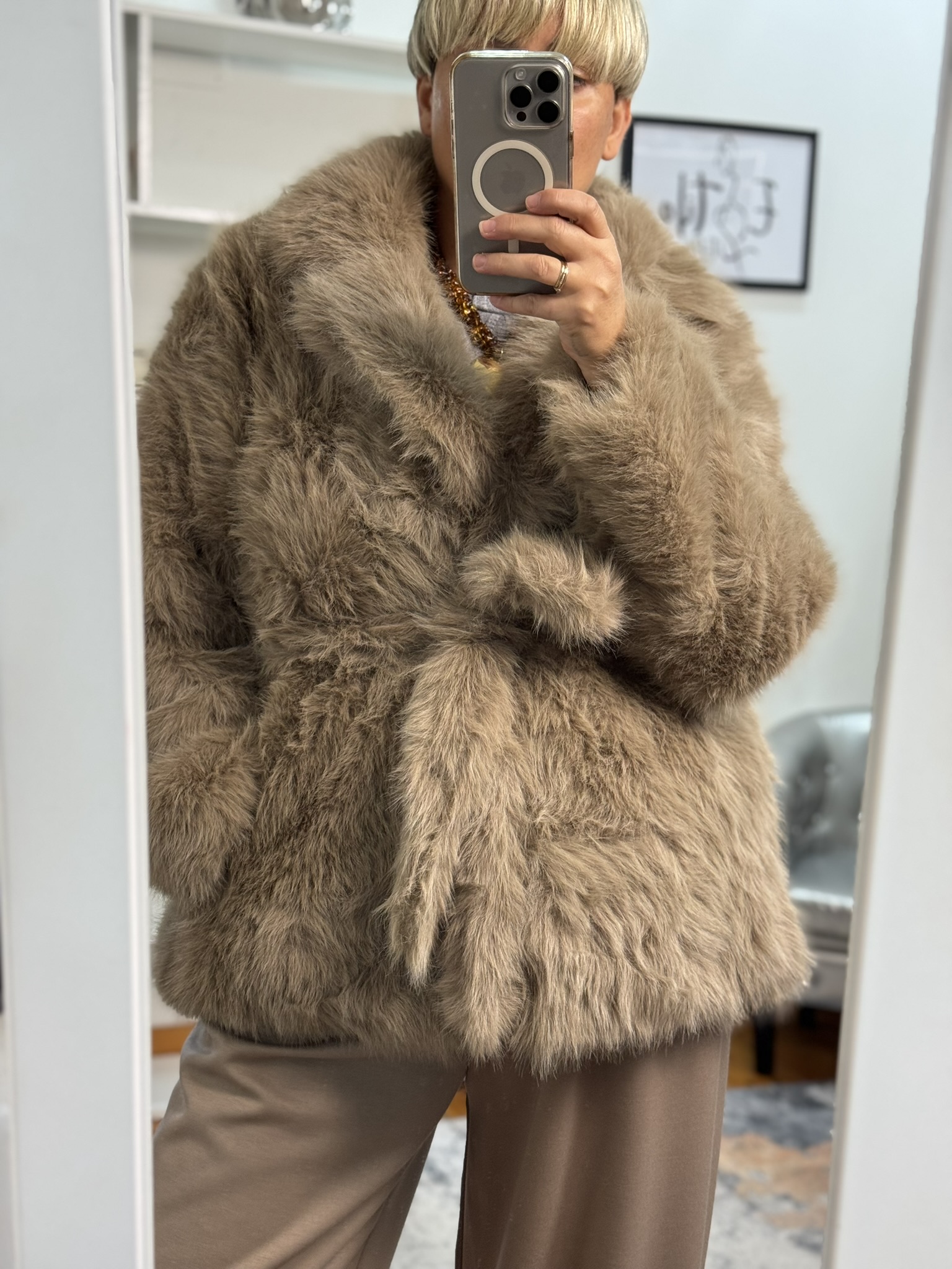 Abrigo pelo cinturón