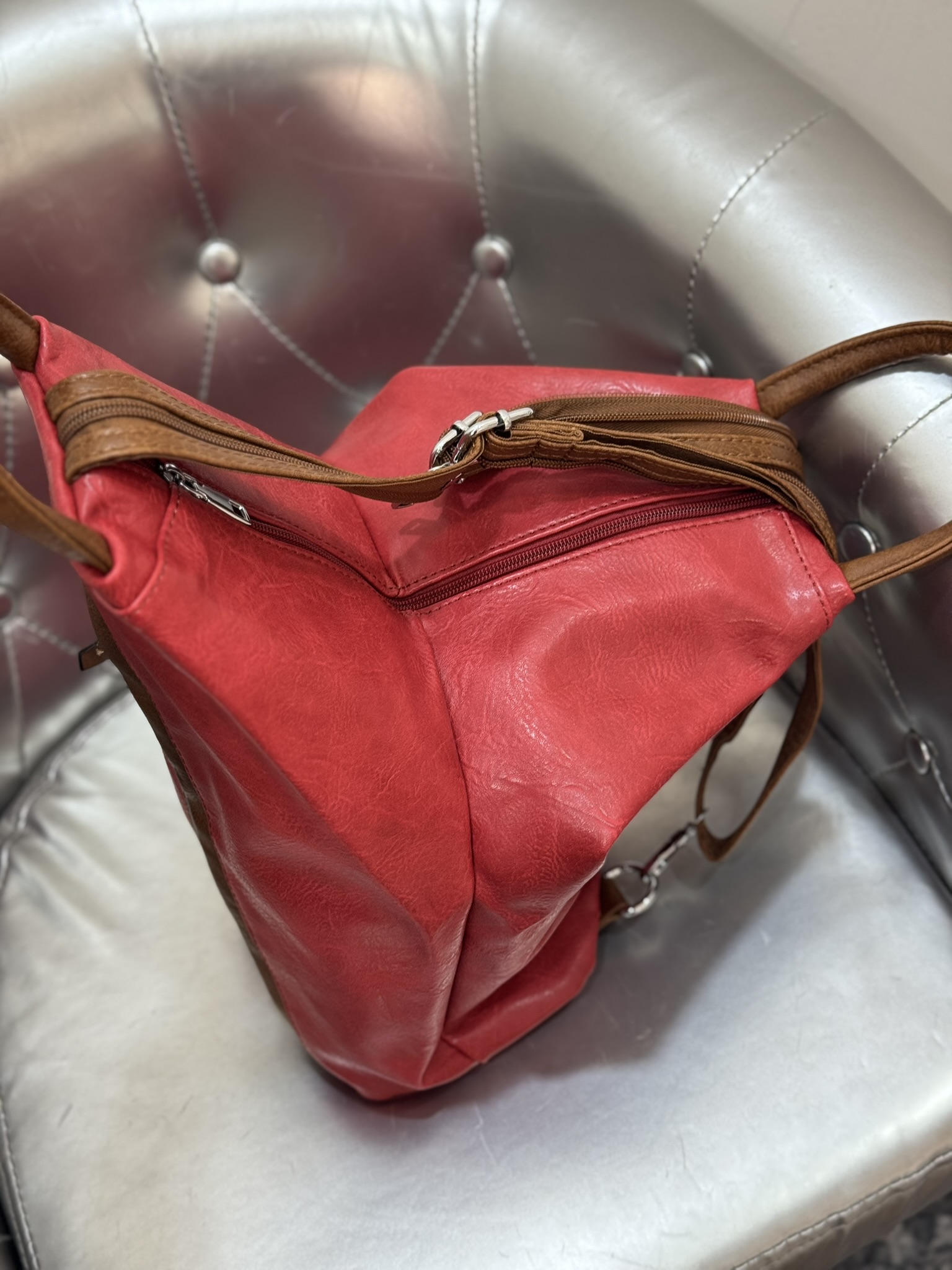 Mochila cremallera cruzada